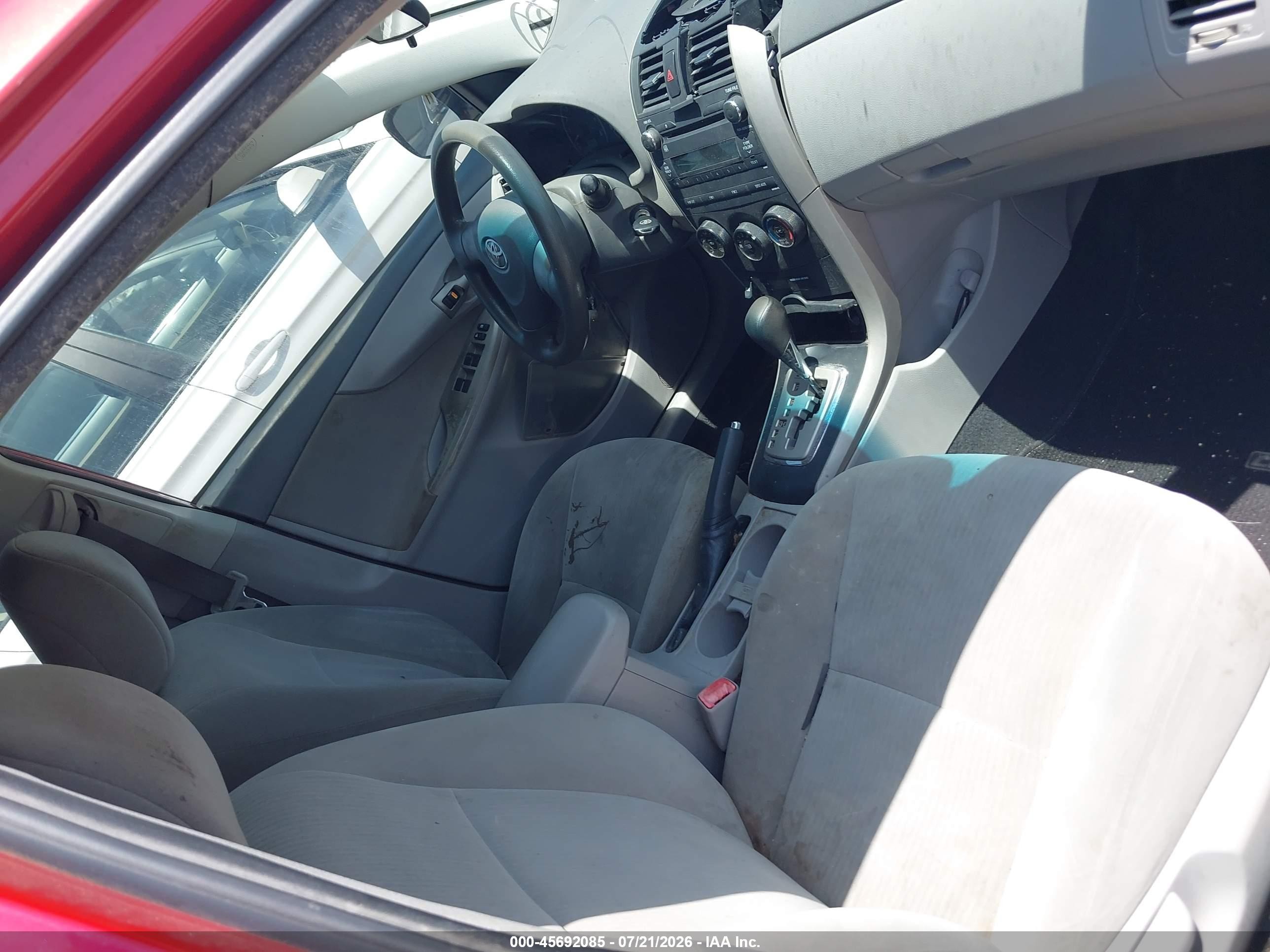 2010 Toyota Corolla Le Red vin: 2T1BU4EE8AC535609