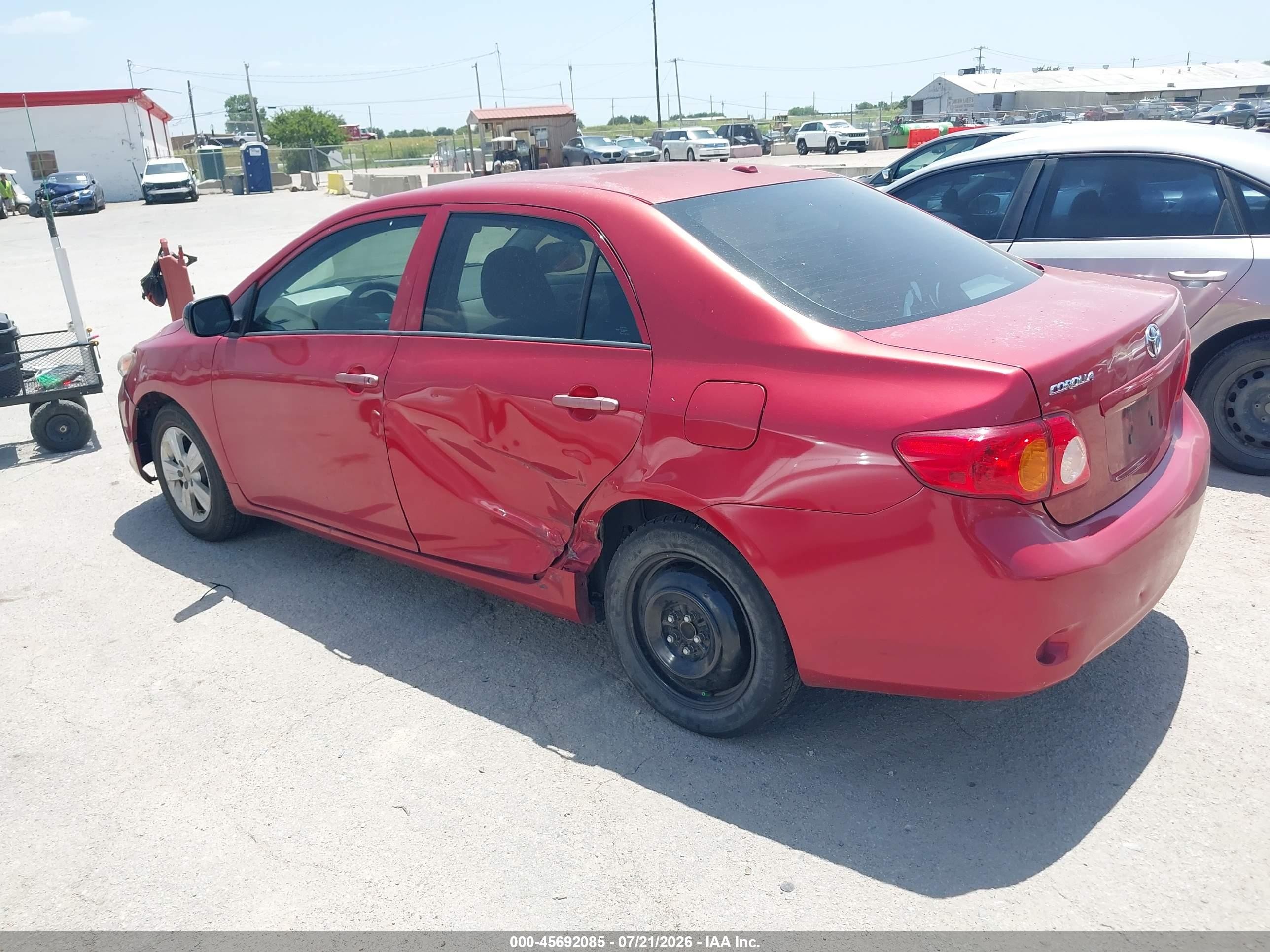 2010 Toyota Corolla Le Red vin: 2T1BU4EE8AC535609