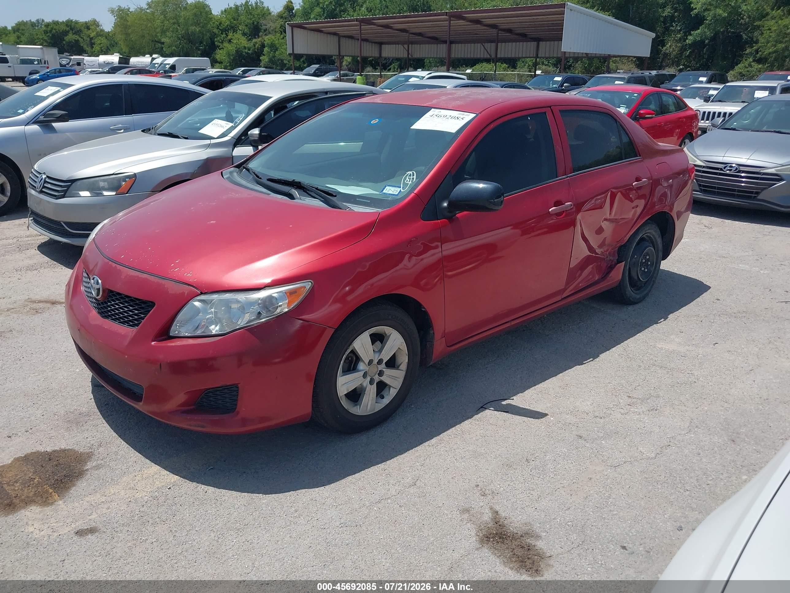 2010 Toyota Corolla Le Red vin: 2T1BU4EE8AC535609