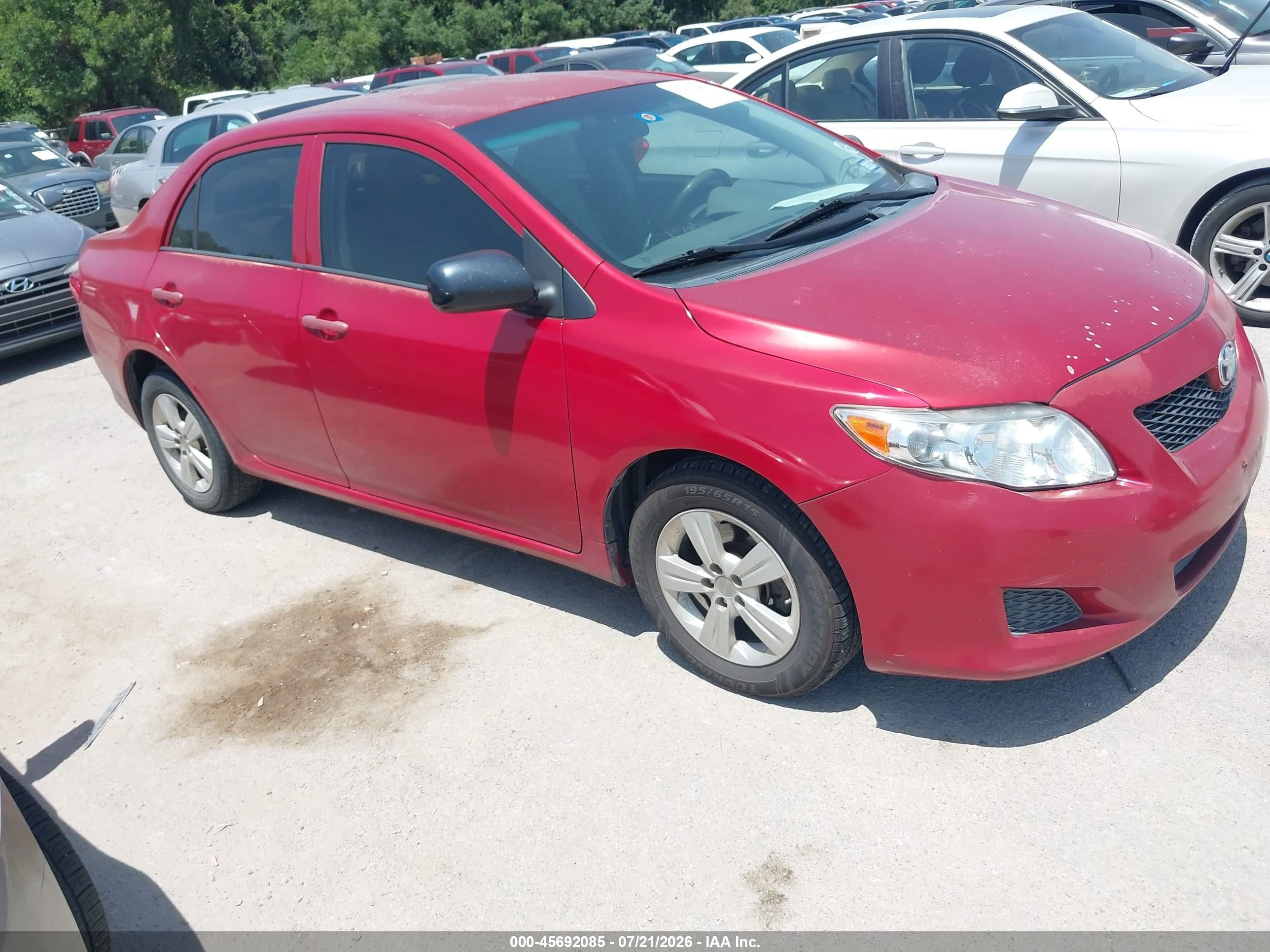 2010 Toyota Corolla Le Red vin: 2T1BU4EE8AC535609