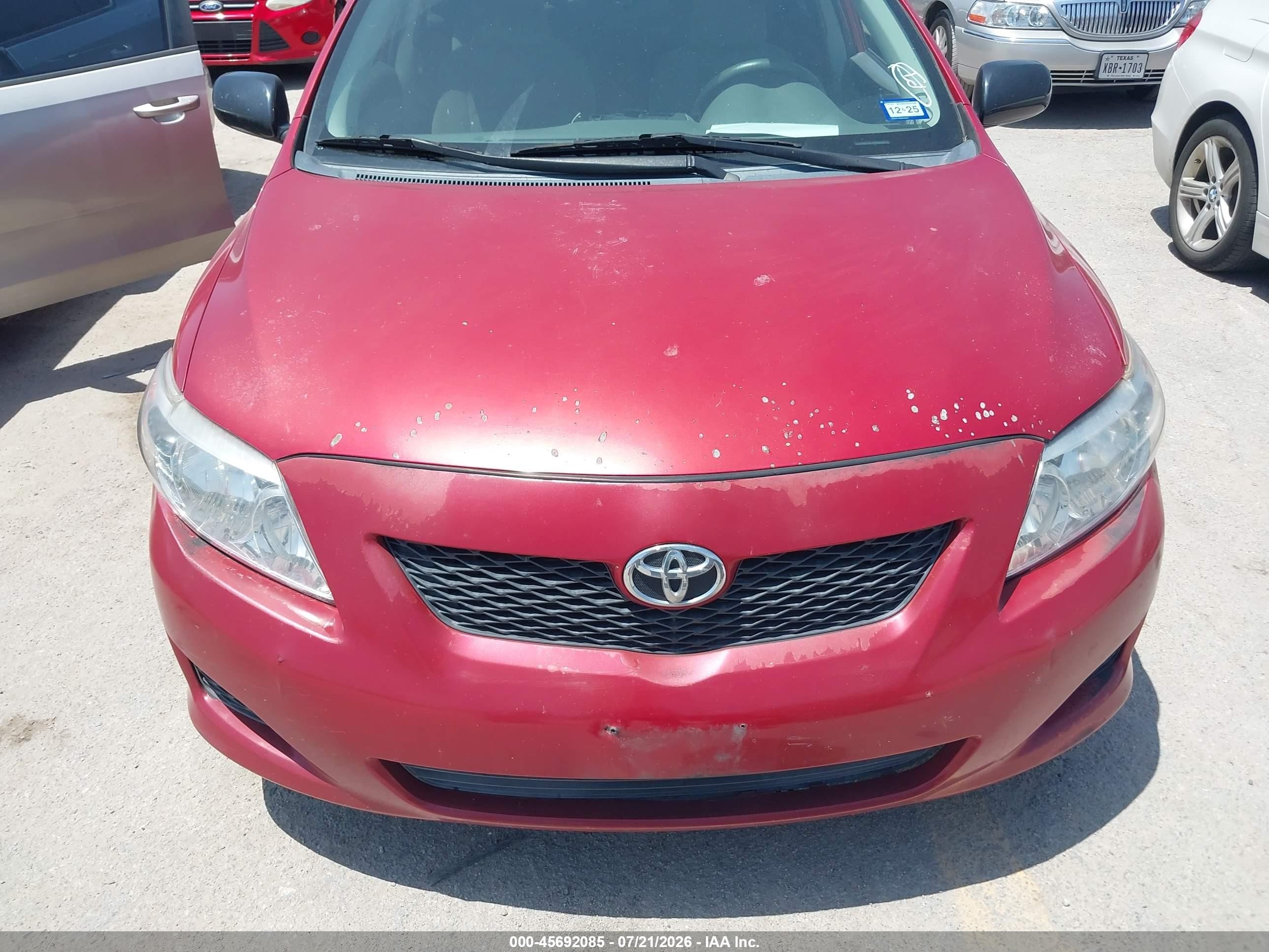 2010 Toyota Corolla Le Red vin: 2T1BU4EE8AC535609