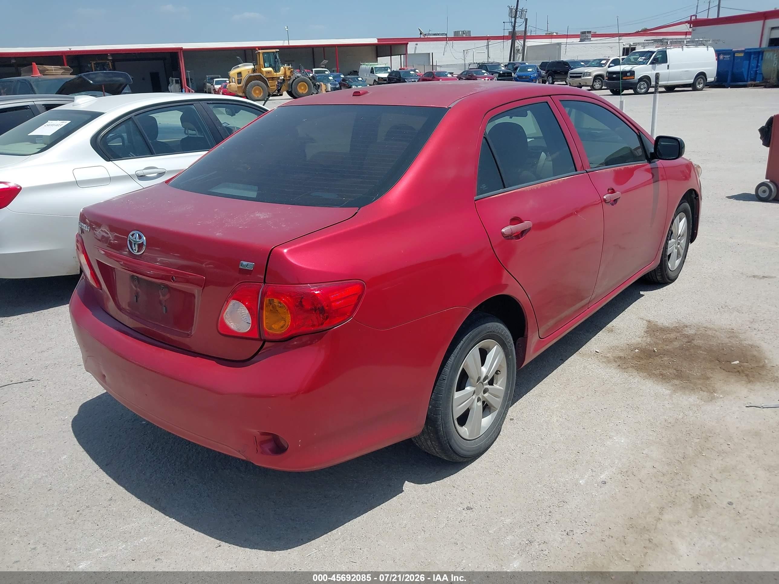 2010 Toyota Corolla Le Red vin: 2T1BU4EE8AC535609