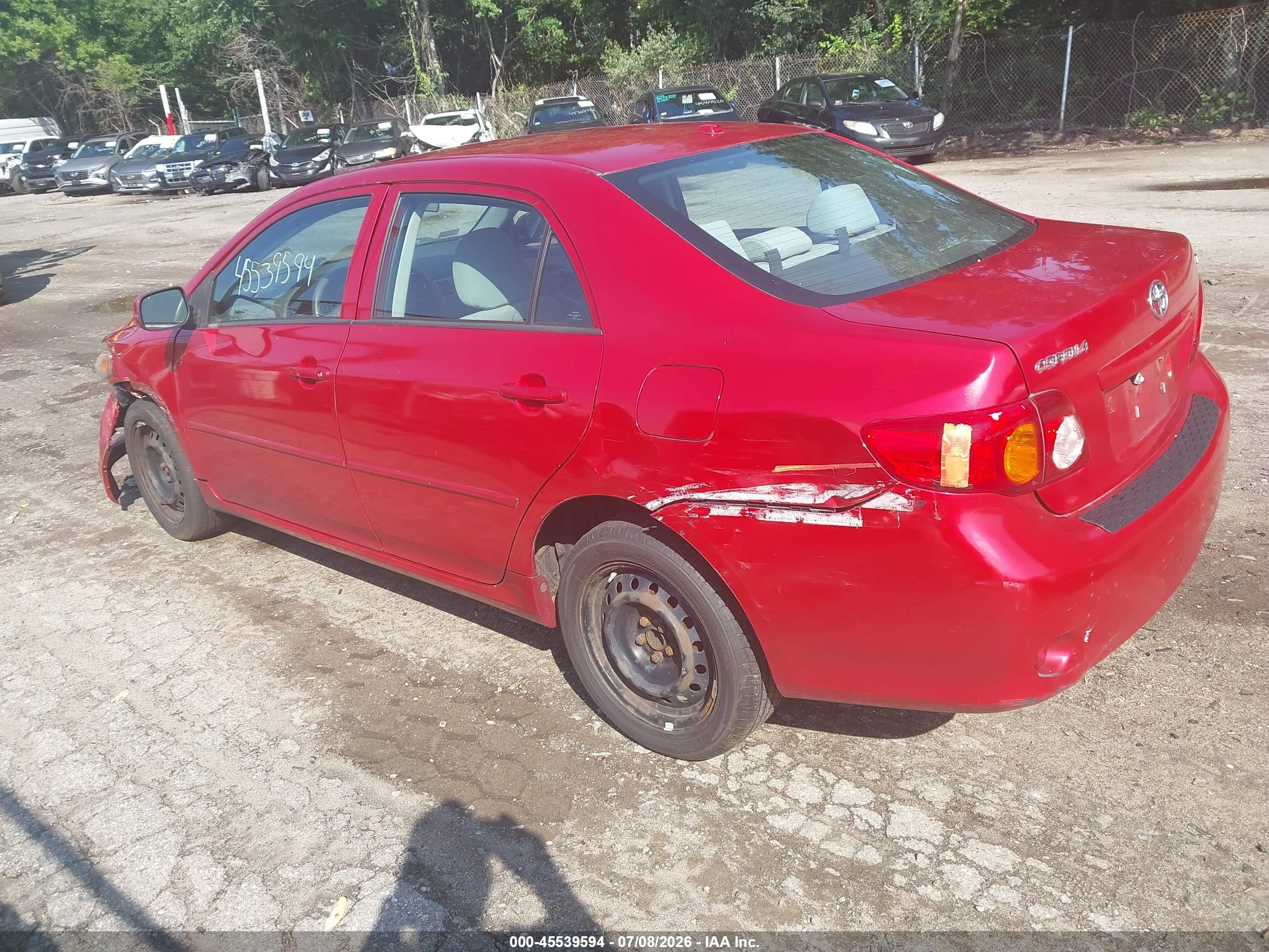 2010 Toyota Corolla Le Red vin: 2T1BU4EE9AC303844