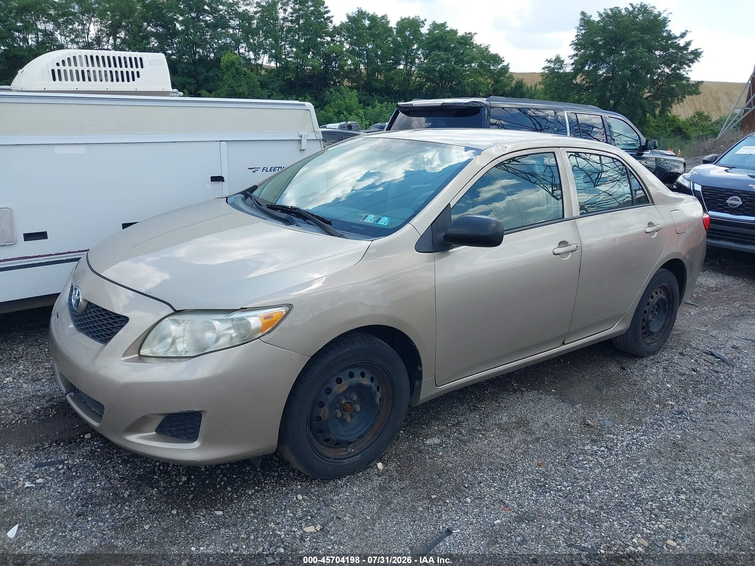 2010 Toyota Corolla Le Tan vin: 2T1BU4EE9AC363252