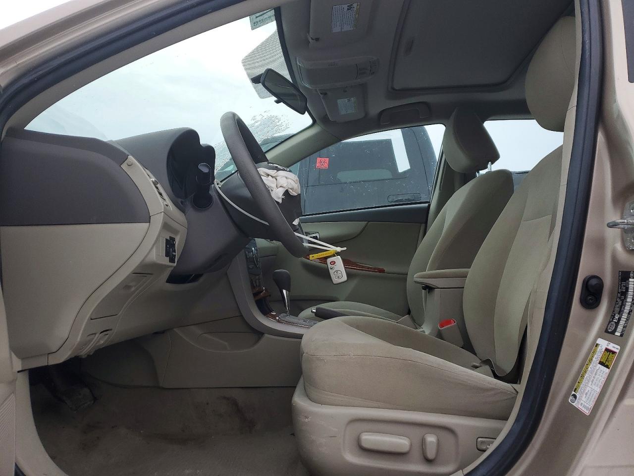 2010 Toyota Corolla Base Tan vin: 2T1BU4EE9AC402860