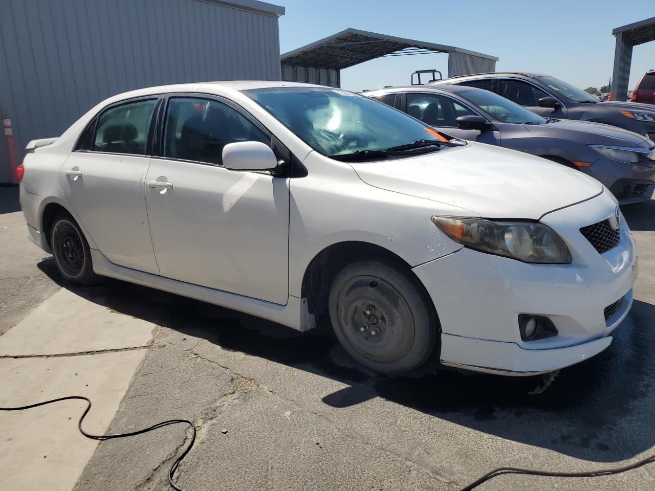 2010 Toyota Corolla S White vin: 2T1BU4EE9AC460080 Damage: Spare Tire, Worn, Replacement Required