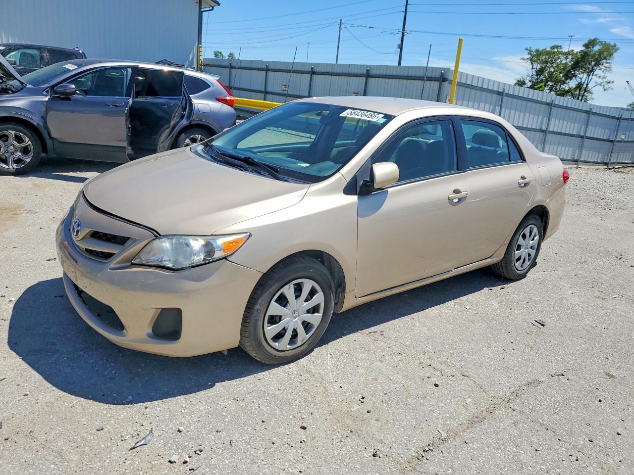 2011 Toyota Corolla Le Gold vin: 2T1BU4EE9BC589082