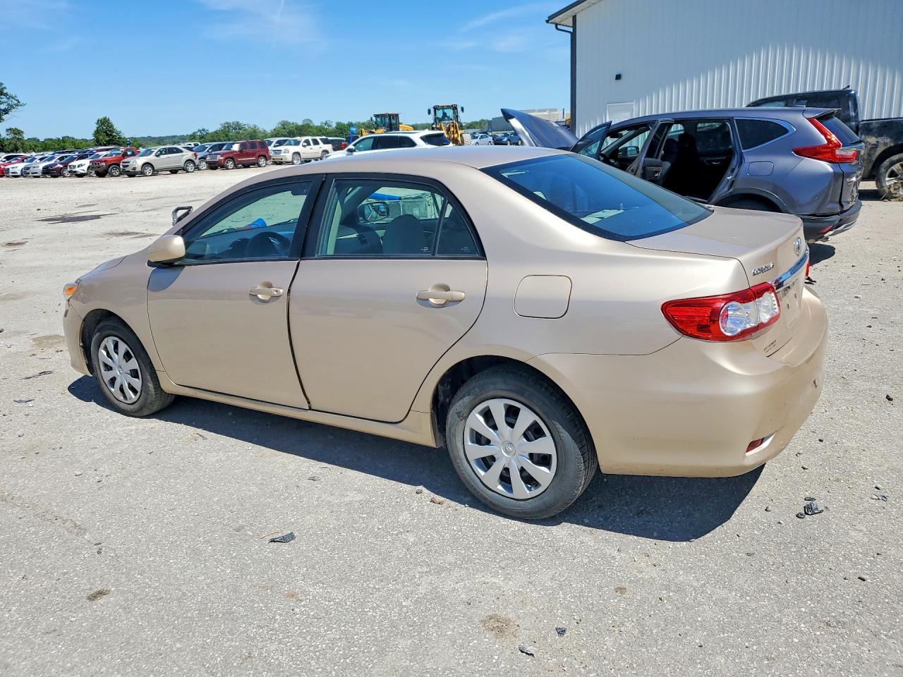 2011 Toyota Corolla Le Gold vin: 2T1BU4EE9BC589082