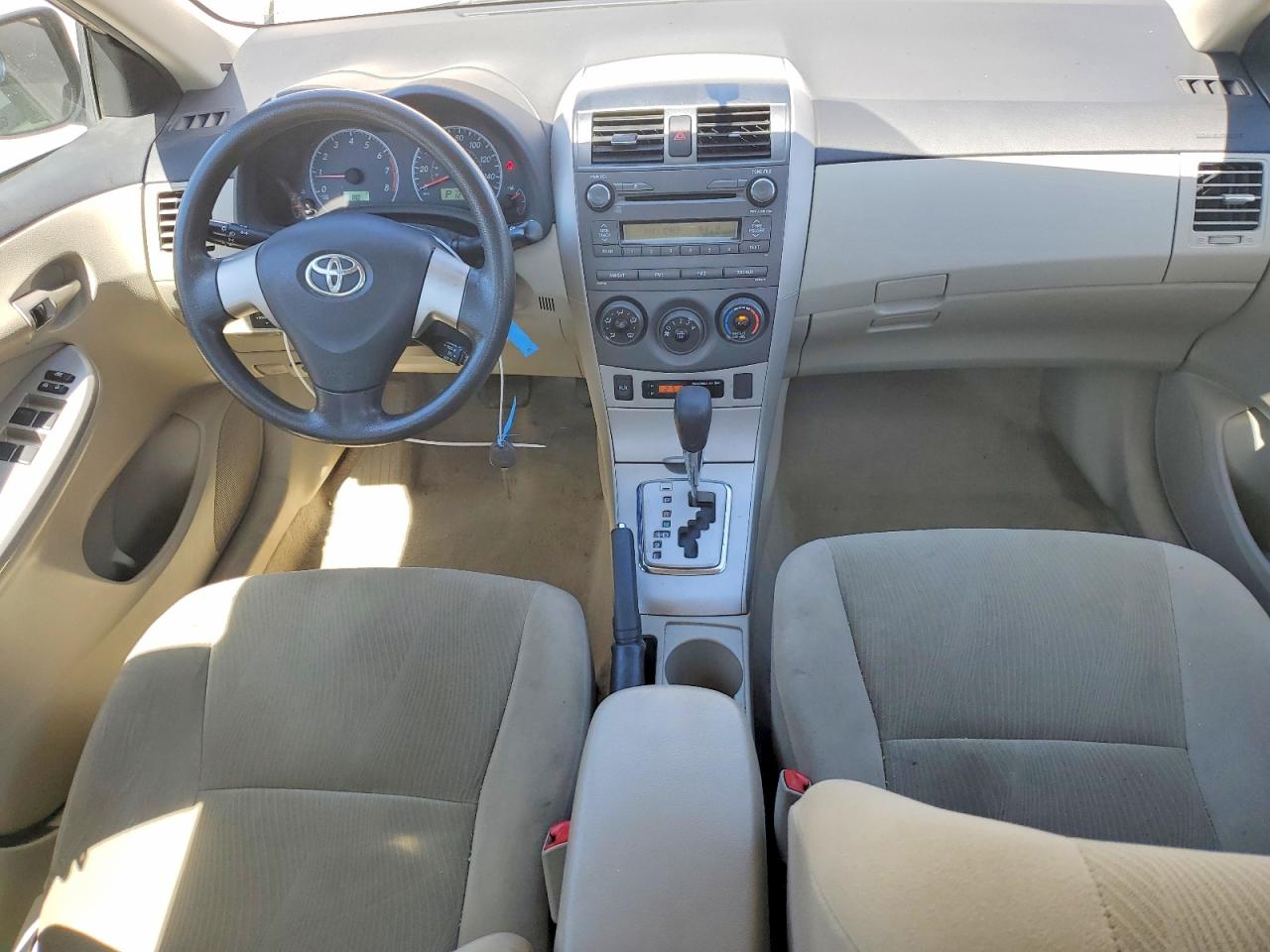 2011 Toyota Corolla Le Gold vin: 2T1BU4EE9BC589082