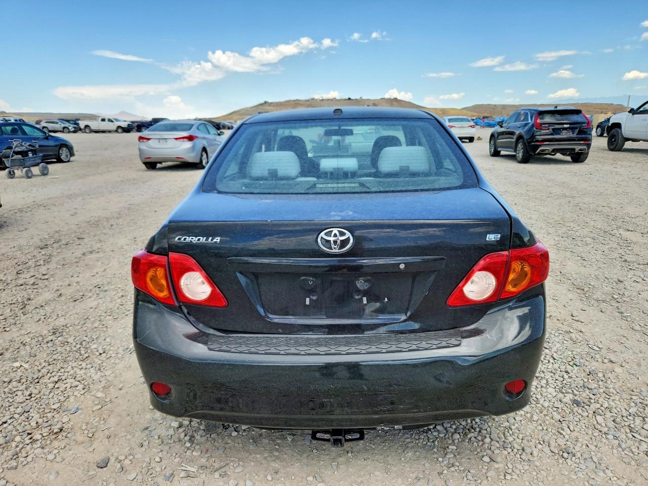 2010 Toyota Corolla Le Black vin: 2T1BU4EEXAC225591