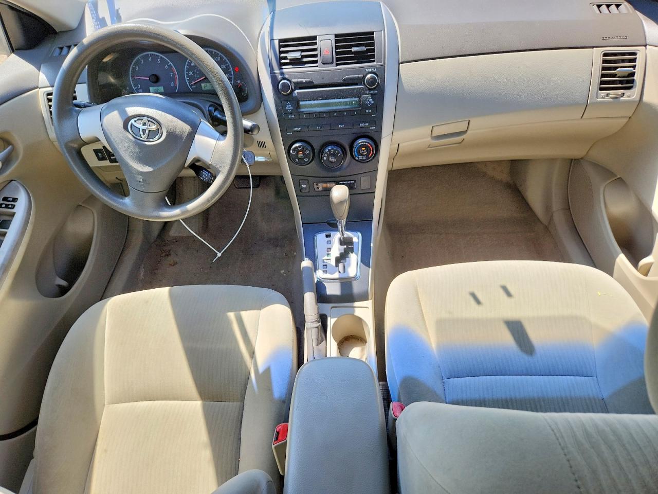 2010 Toyota Corolla Le Gold vin: 2T1BU4EEXAC292370
