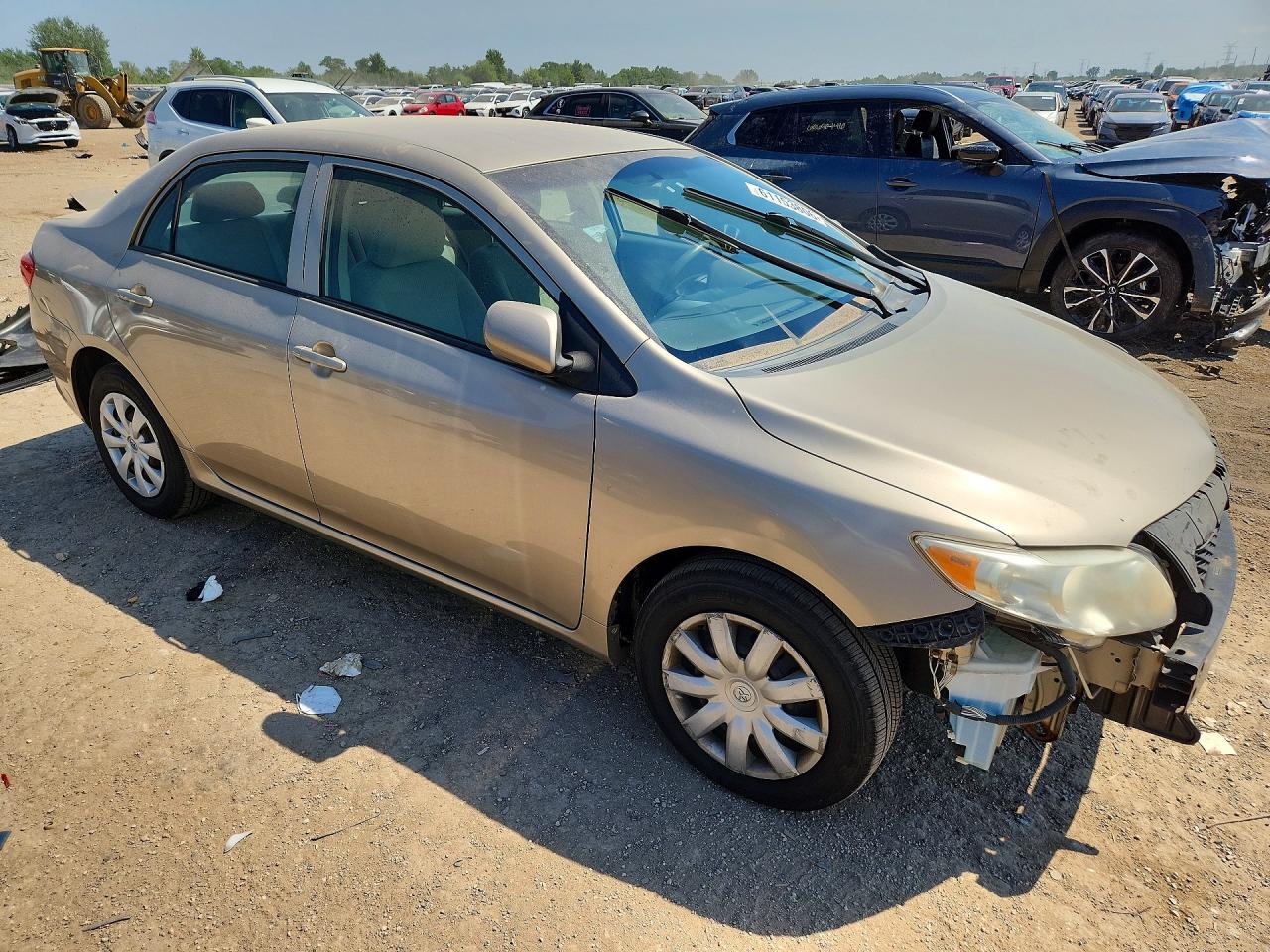 2010 Toyota Corolla Le Gold vin: 2T1BU4EEXAC292370