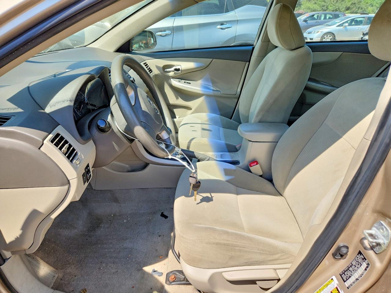 2010 Toyota Corolla Le Gold vin: 2T1BU4EEXAC292370