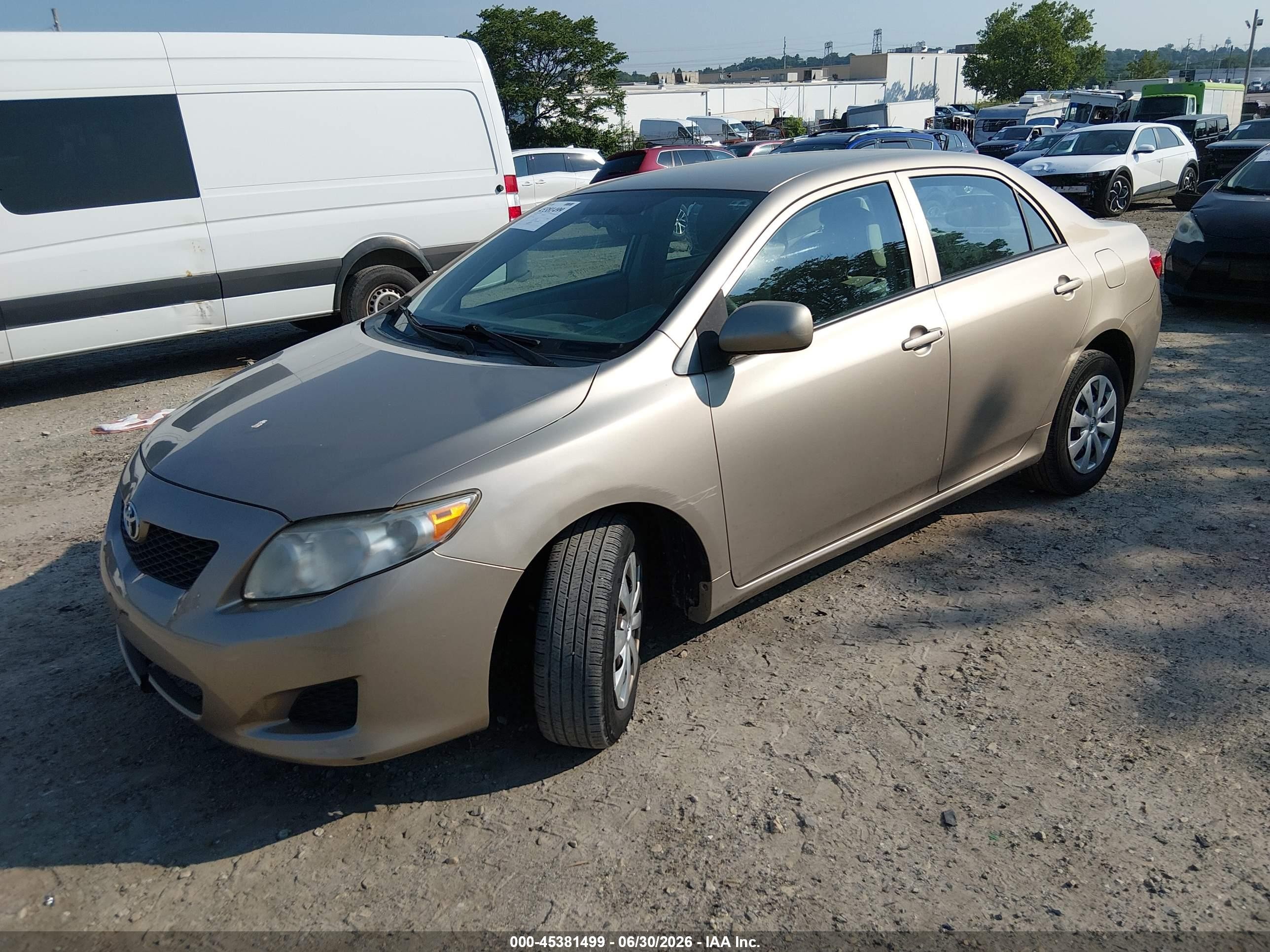 2010 Toyota Corolla Le Beige vin: 2T1BU4EEXAC338442