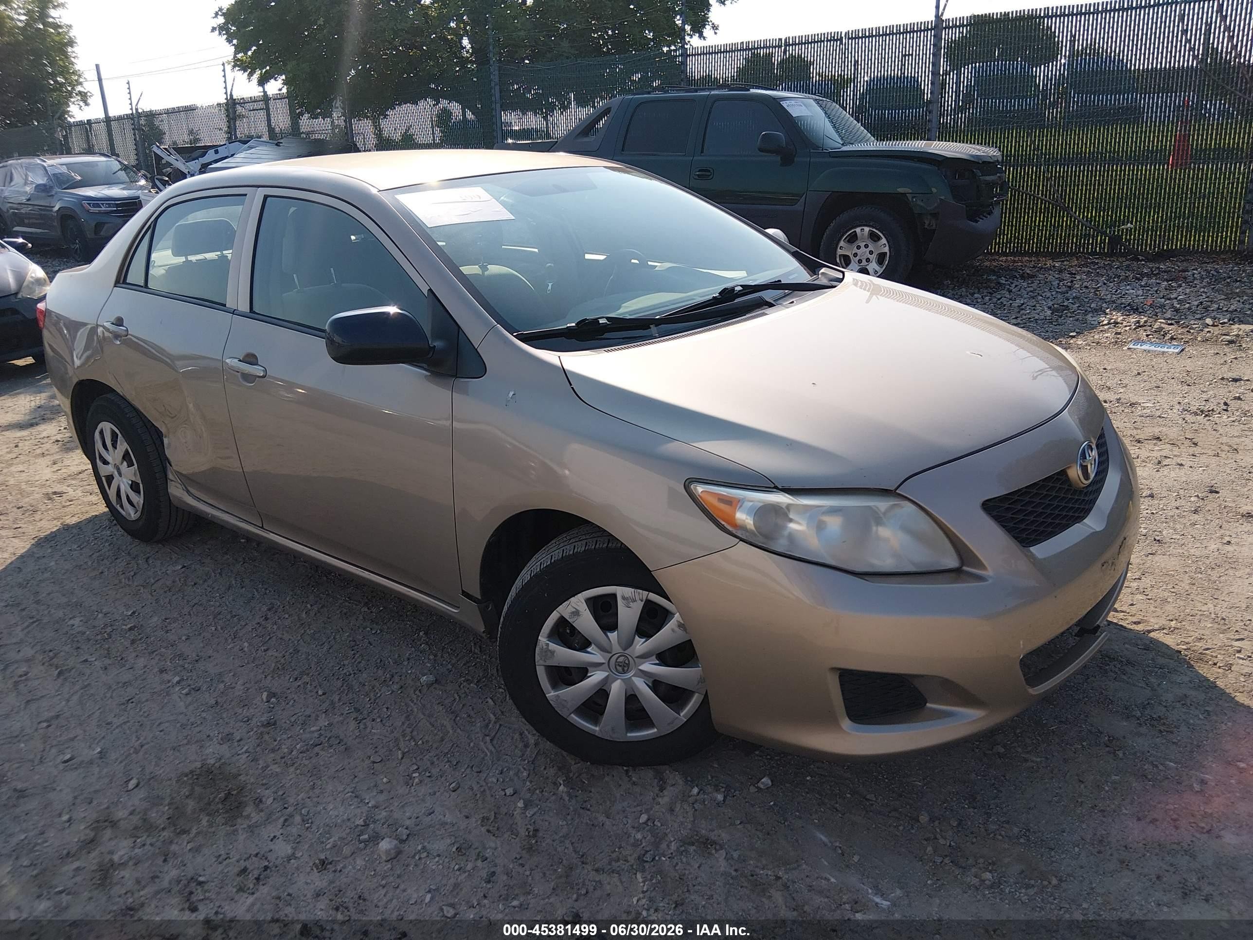 2010 Toyota Corolla Le Beige vin: 2T1BU4EEXAC338442