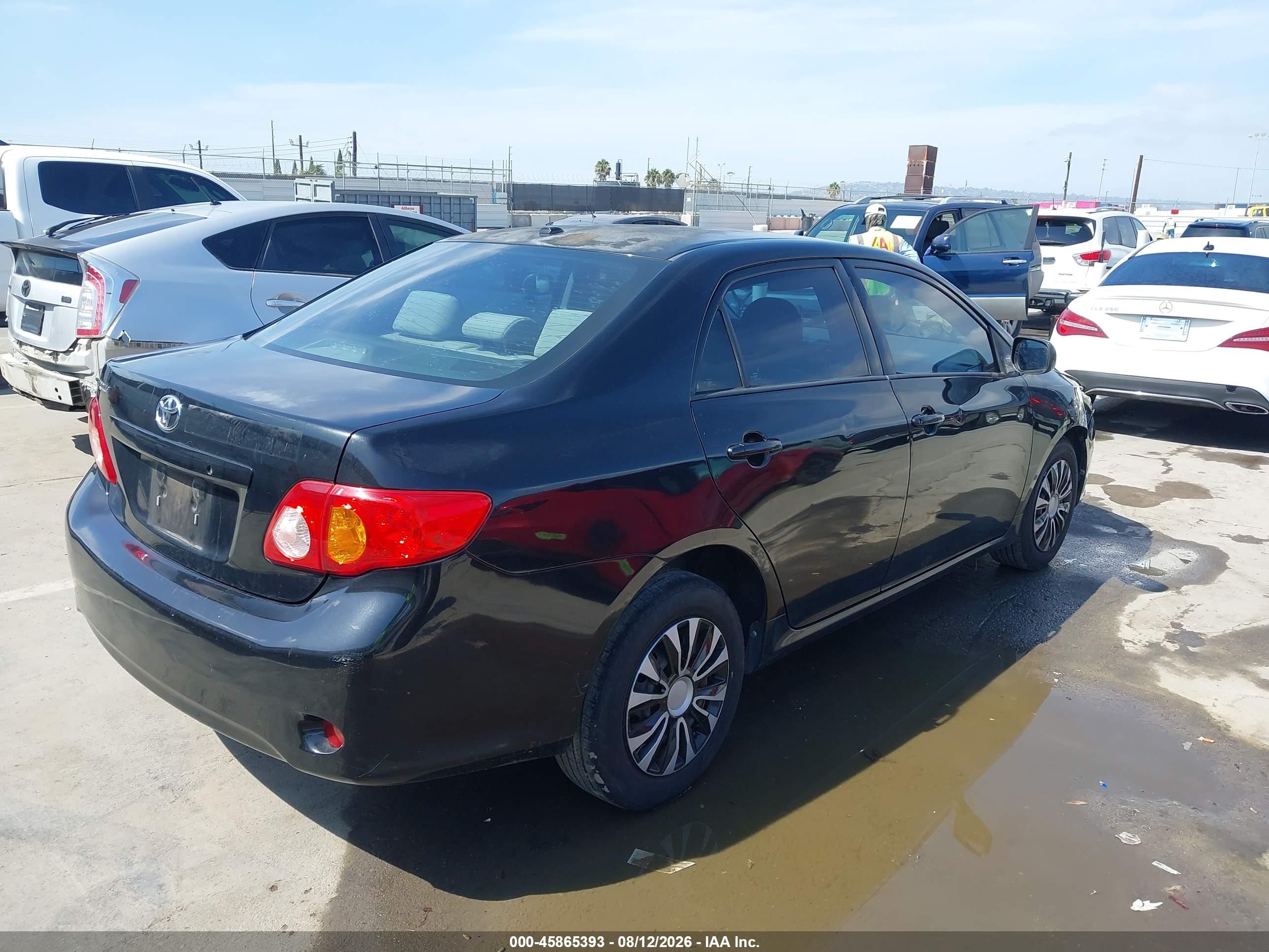 2010 Toyota Corolla Le Black vin: 2T1BU4EEXAC382098