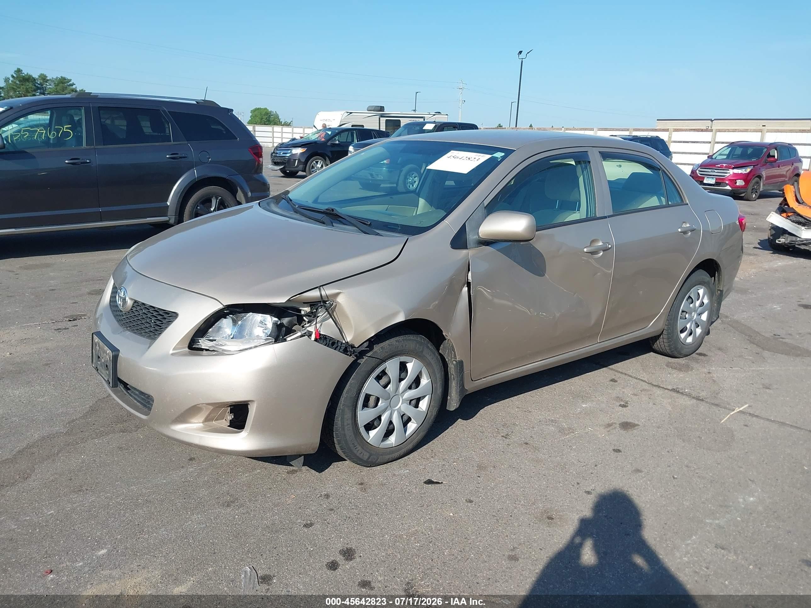 2010 Toyota Corolla Le Beige vin: 2T1BU4EEXAC387432