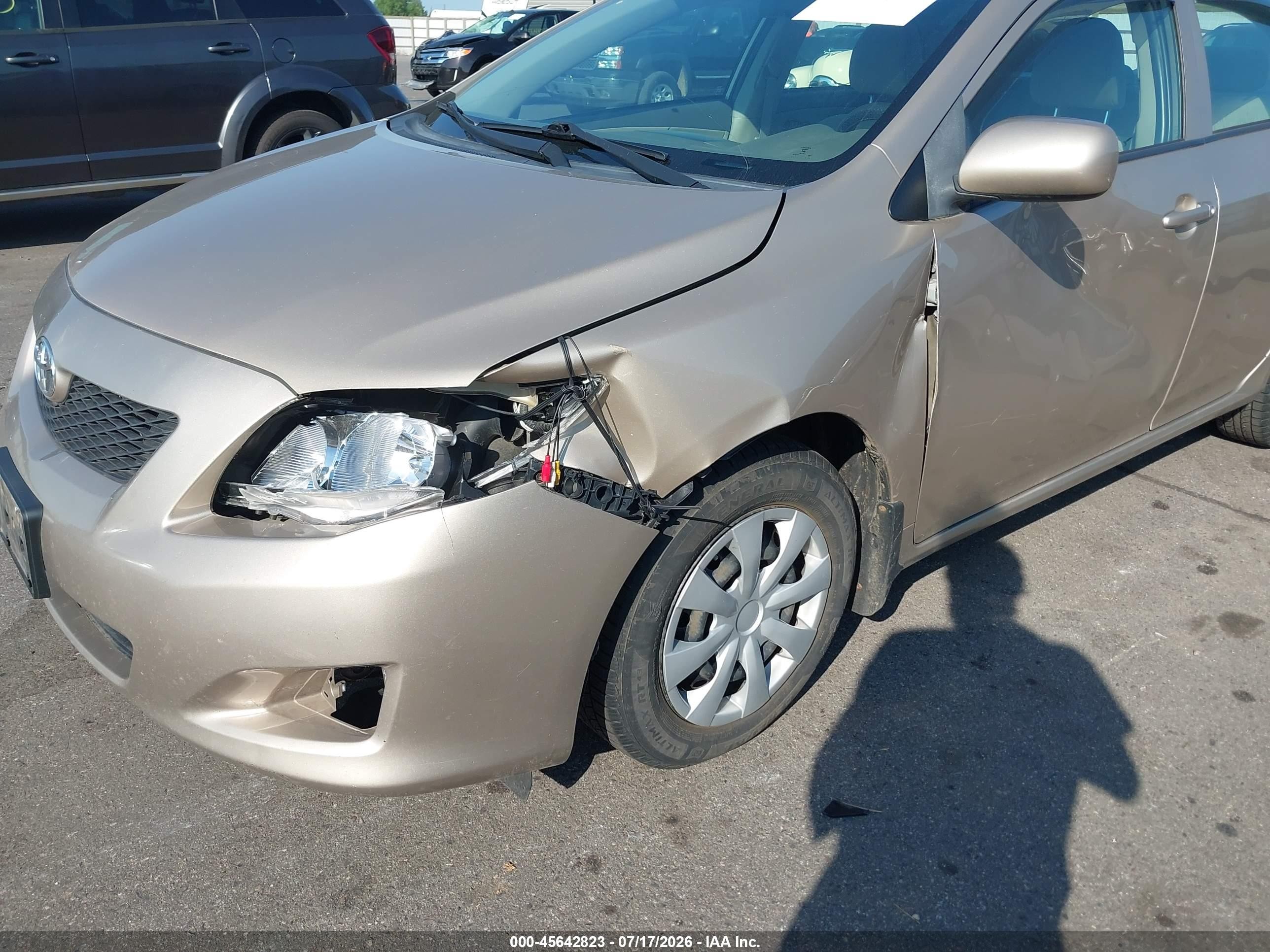 2010 Toyota Corolla Le Beige vin: 2T1BU4EEXAC387432