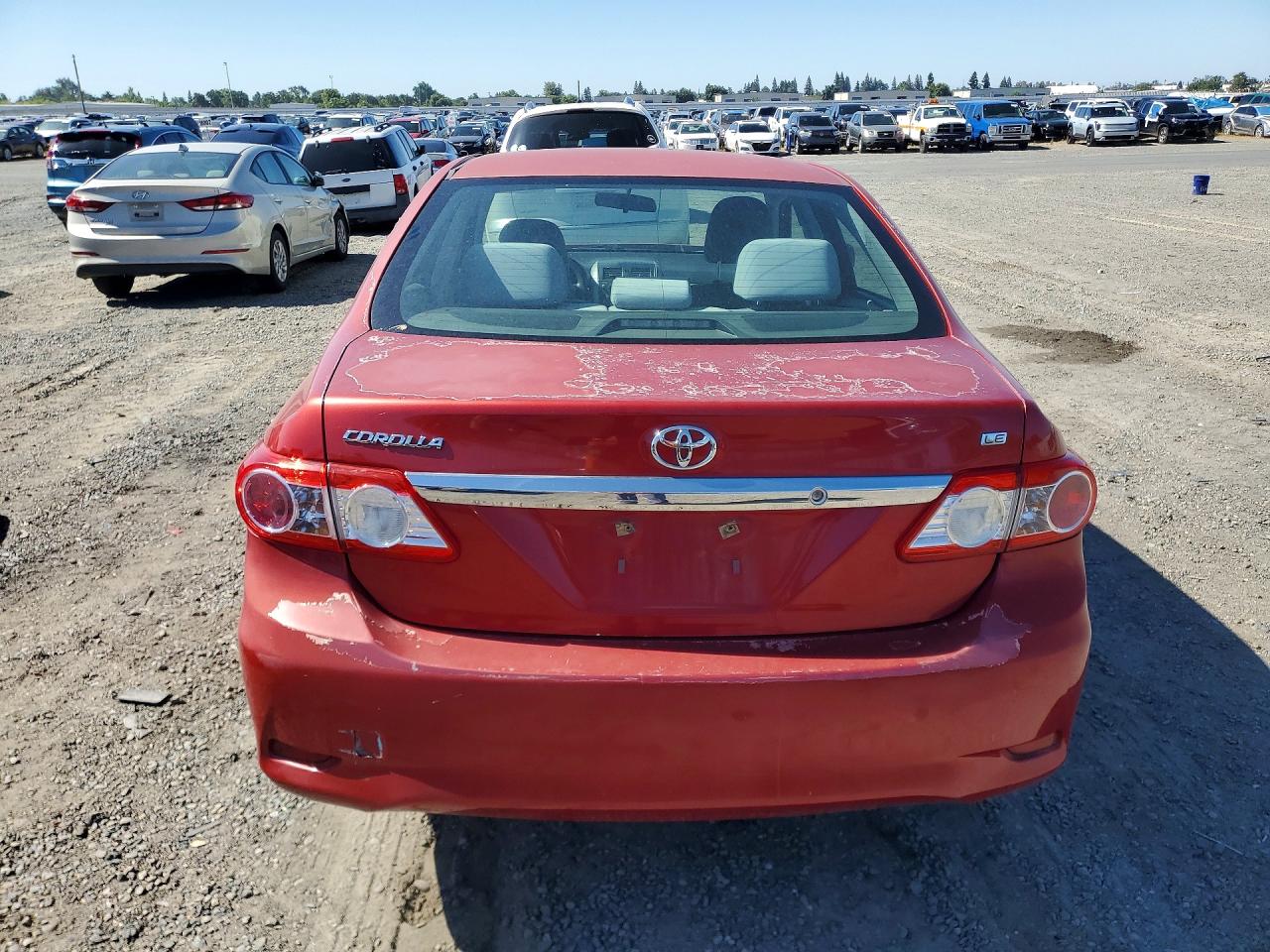 2011 Toyota Corolla Le Red vin: 2T1BU4EEXBC542644