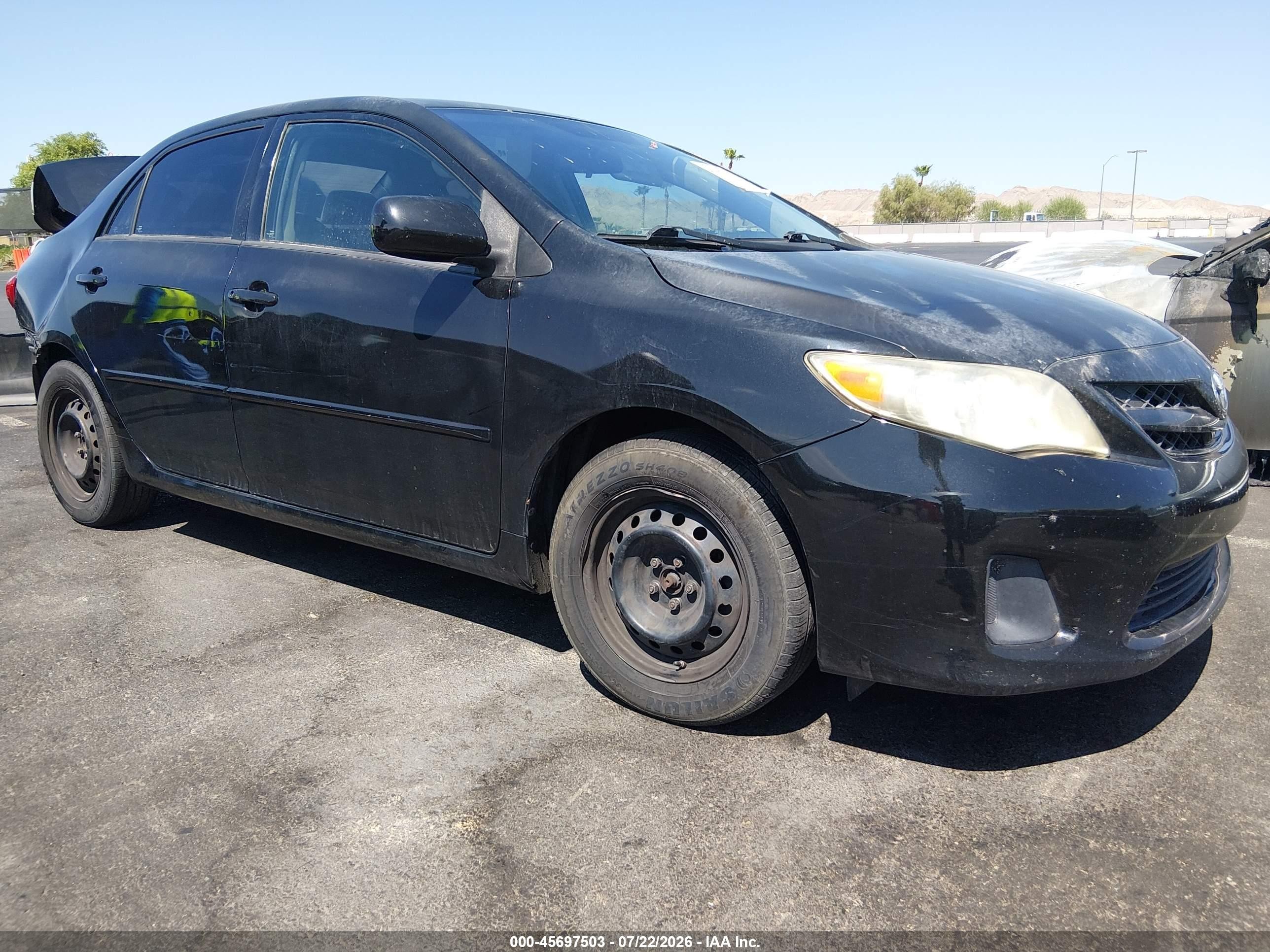 2011 Toyota Corolla   Black vin: 2T1BU4EEXBC636975