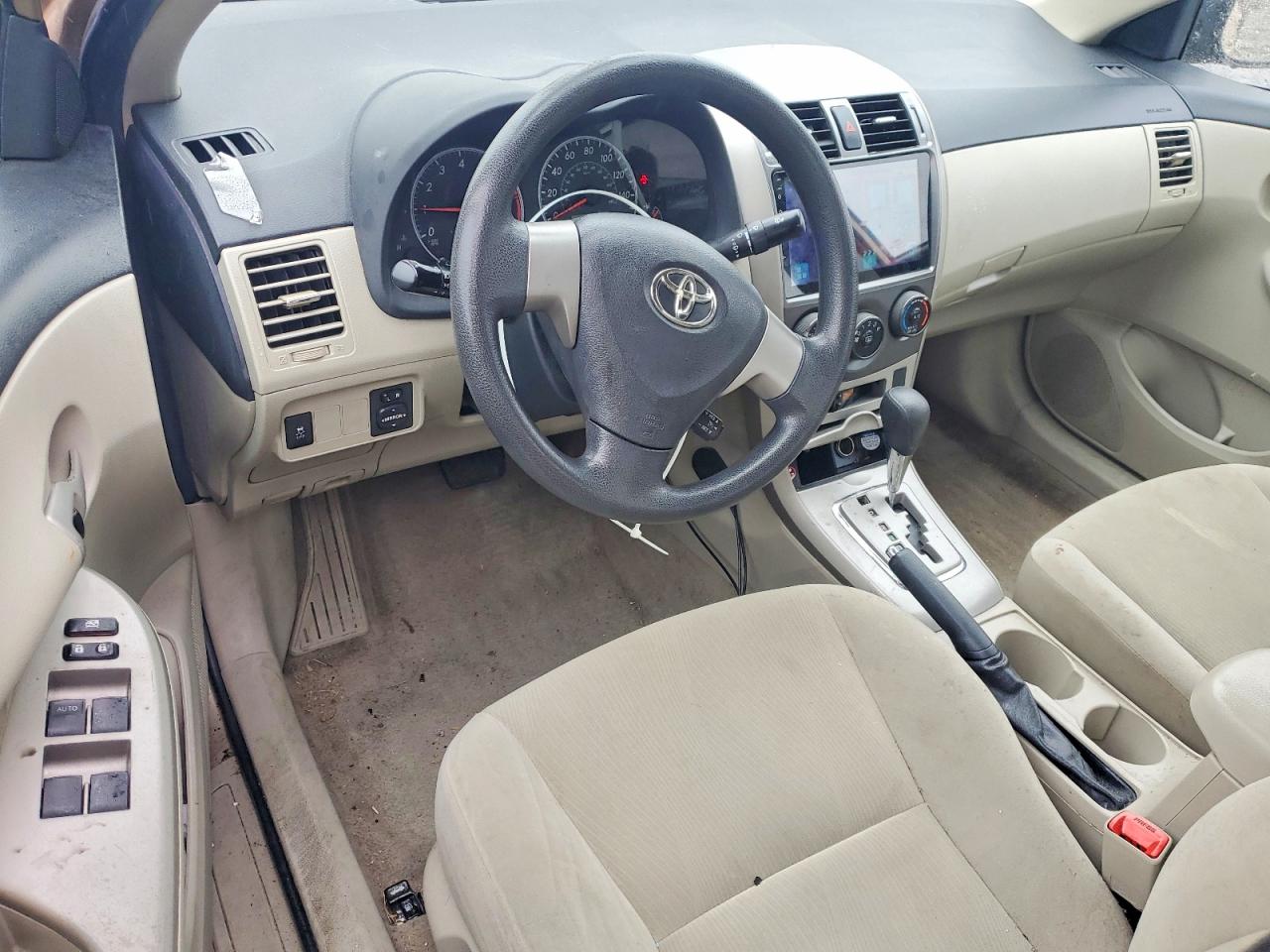 2011 Toyota Corolla Le Beige vin: 2T1BU4EEXBC656126