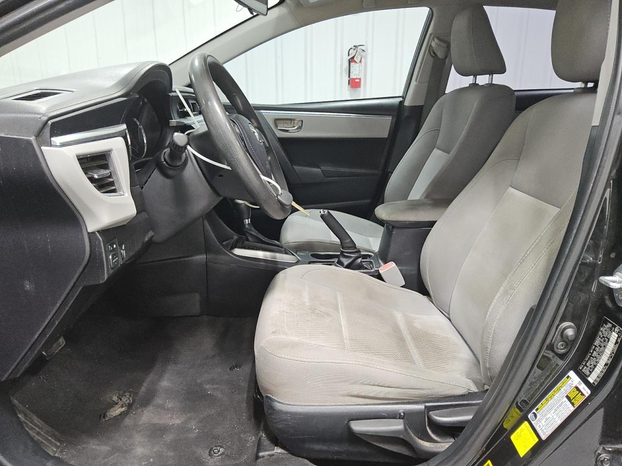 2015 Toyota Corolla Le Black vin: 2T1BURHE2FC422450 Damage: Left Front Carpet, Worn, Replacement Required