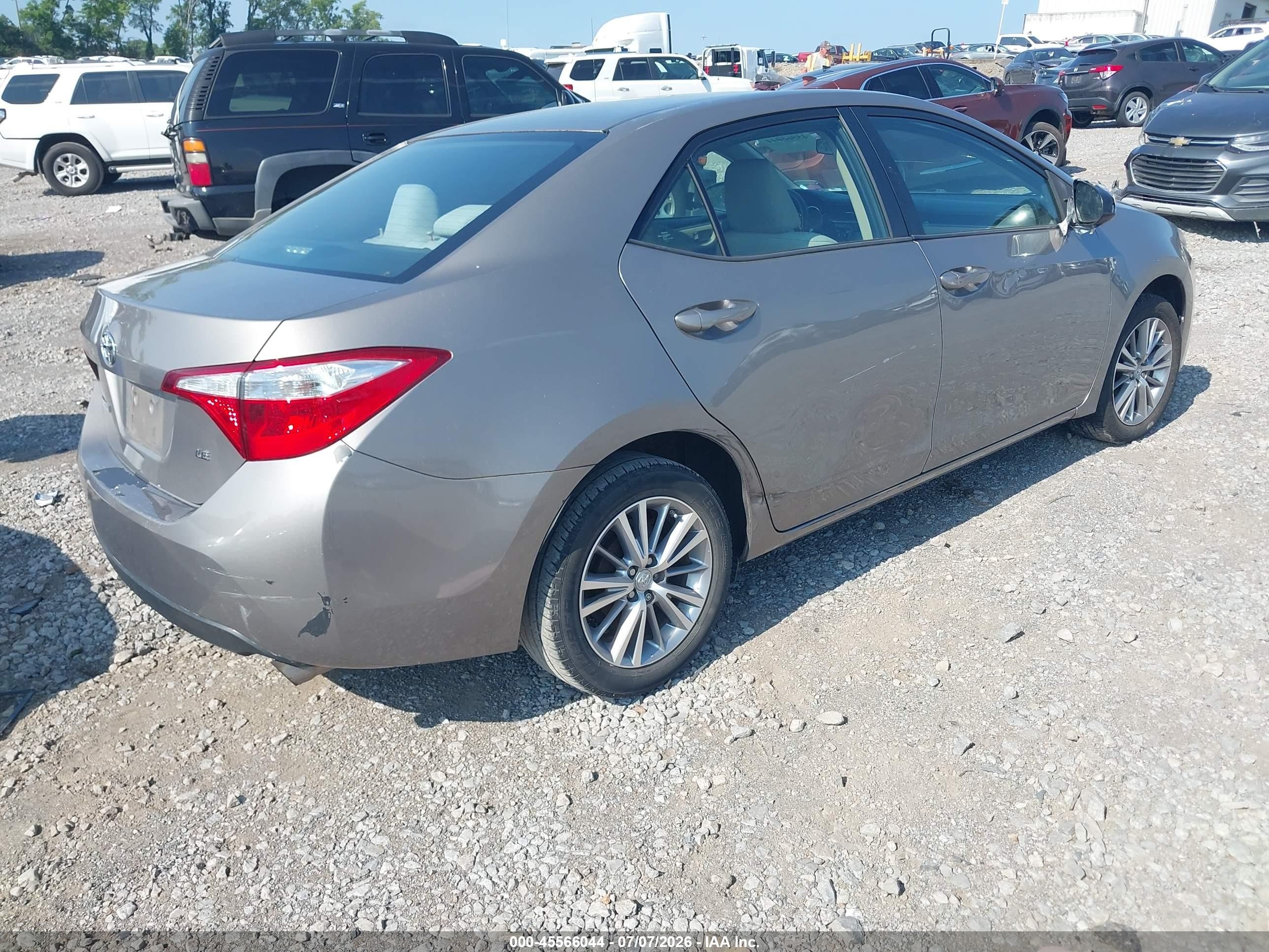 2014 Toyota Corolla Le Plus Tan vin: 2T1BURHE7EC002441