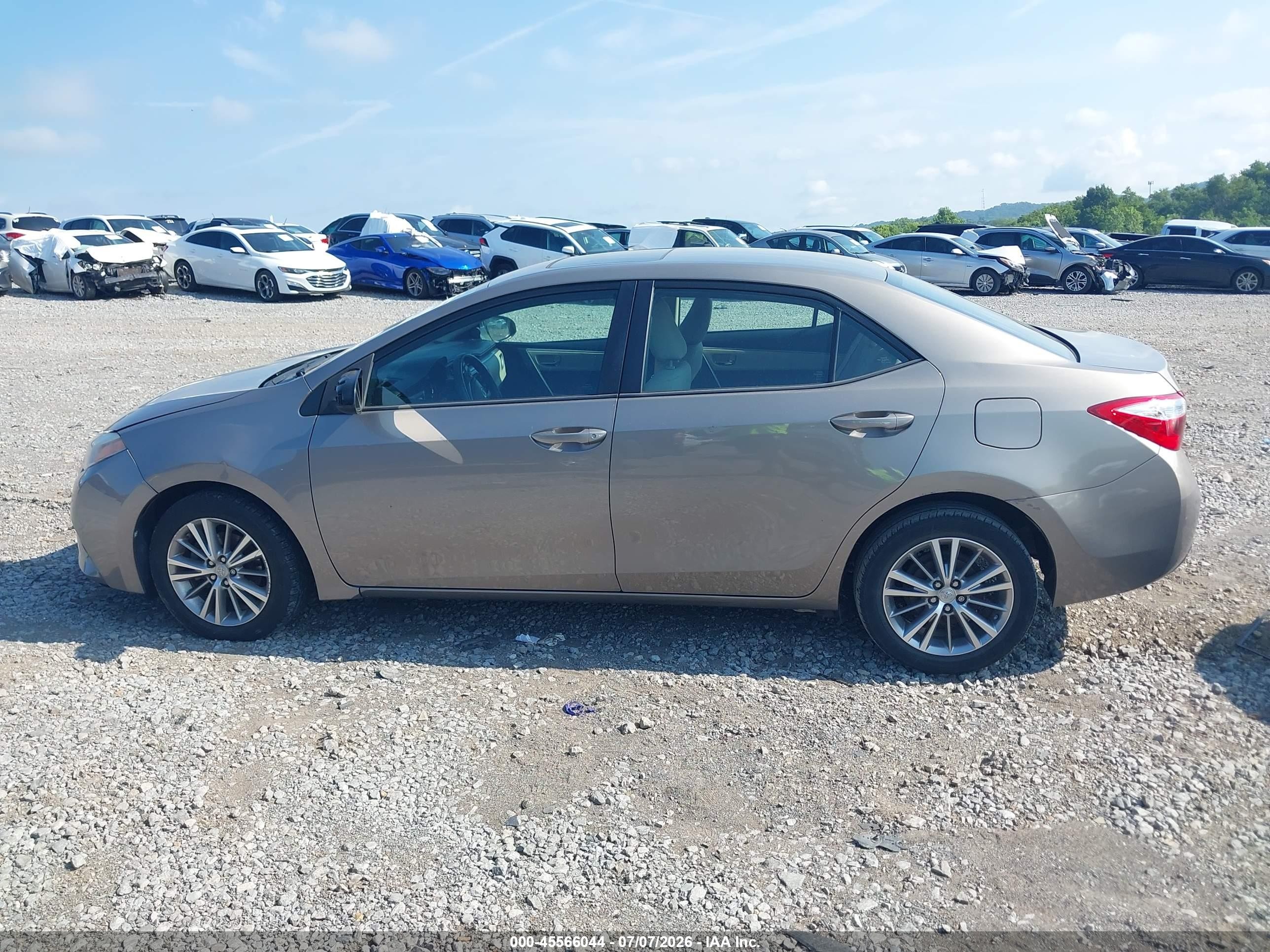 2014 Toyota Corolla Le Plus Tan vin: 2T1BURHE7EC002441