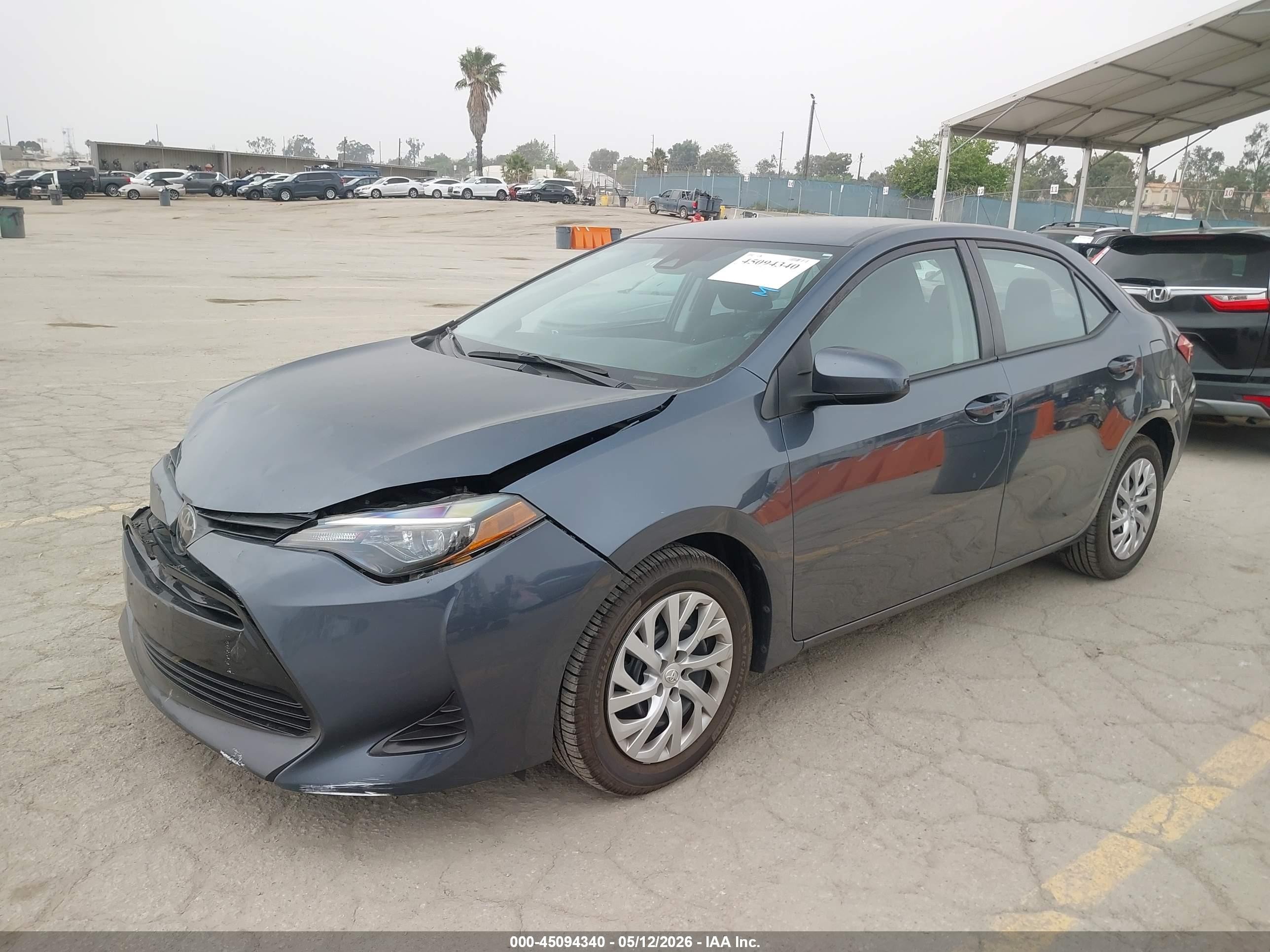 2019 Toyota Corolla Le Blue vin: 2T1BURHE9KC246359