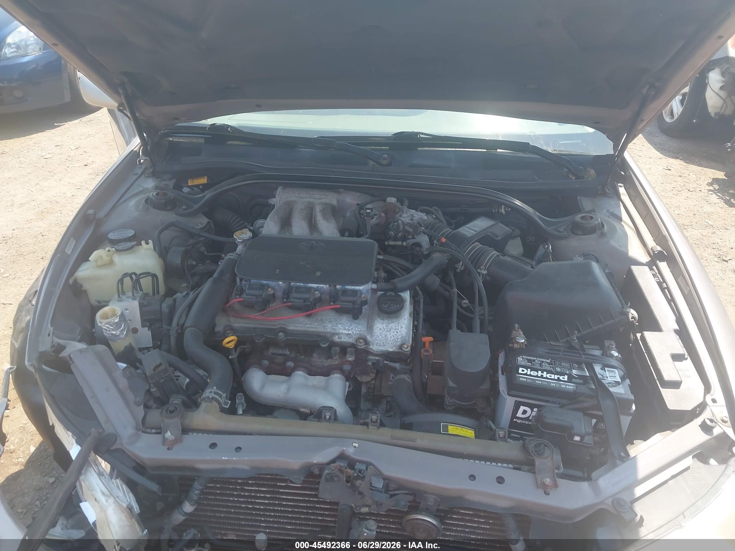 1999 Toyota Camry Solara Sle Cream vin: 2T1CF22P9XC166406