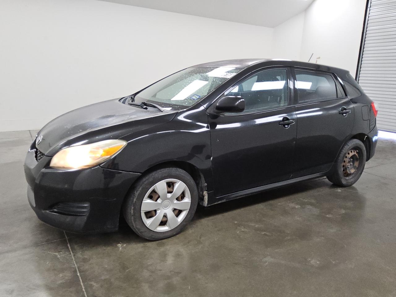2009 Toyota Matrix Base Black vin: 2T1KU40E49C088294 Damage: Front Bumper/Cover, Broken, Replacement Required