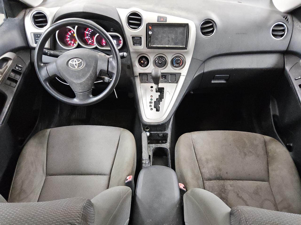 2009 Toyota Matrix Base Black vin: 2T1KU40E49C088294 Damage: Left Front Seat Cushion, Stained, Permanent