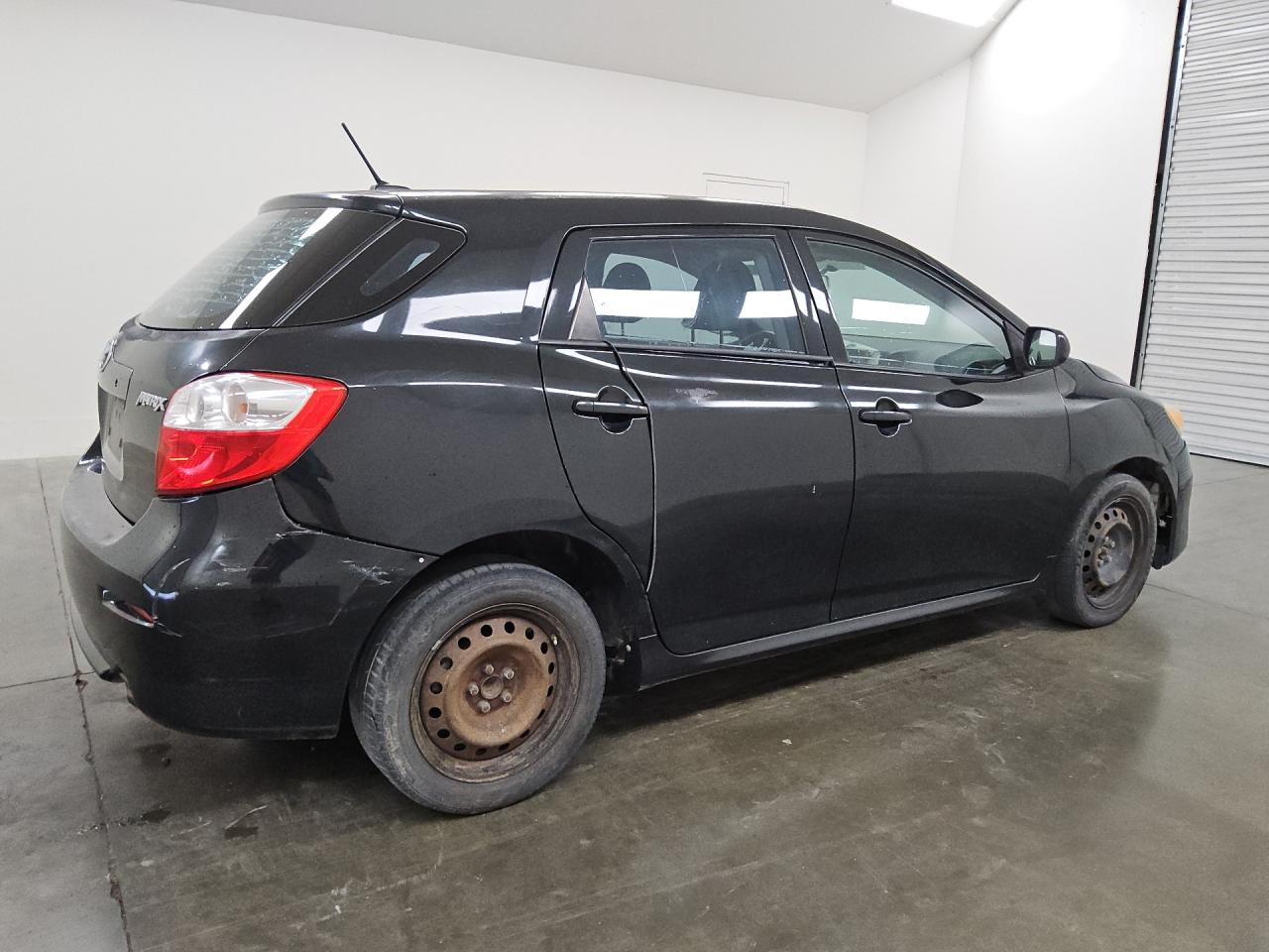 2009 Toyota Matrix Base Black vin: 2T1KU40E49C088294 Damage: Right Qtr Panel, Dent(S) W/ Paint Dmg, 2 To 3 Inches