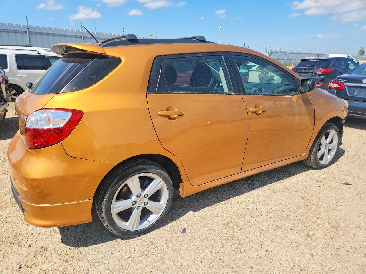 2009 Toyota Corolla Matrix S Gold vin: 2T1LE40E09C002867