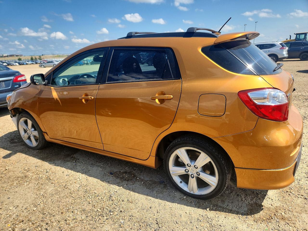 2009 Toyota Corolla Matrix S Gold vin: 2T1LE40E09C002867