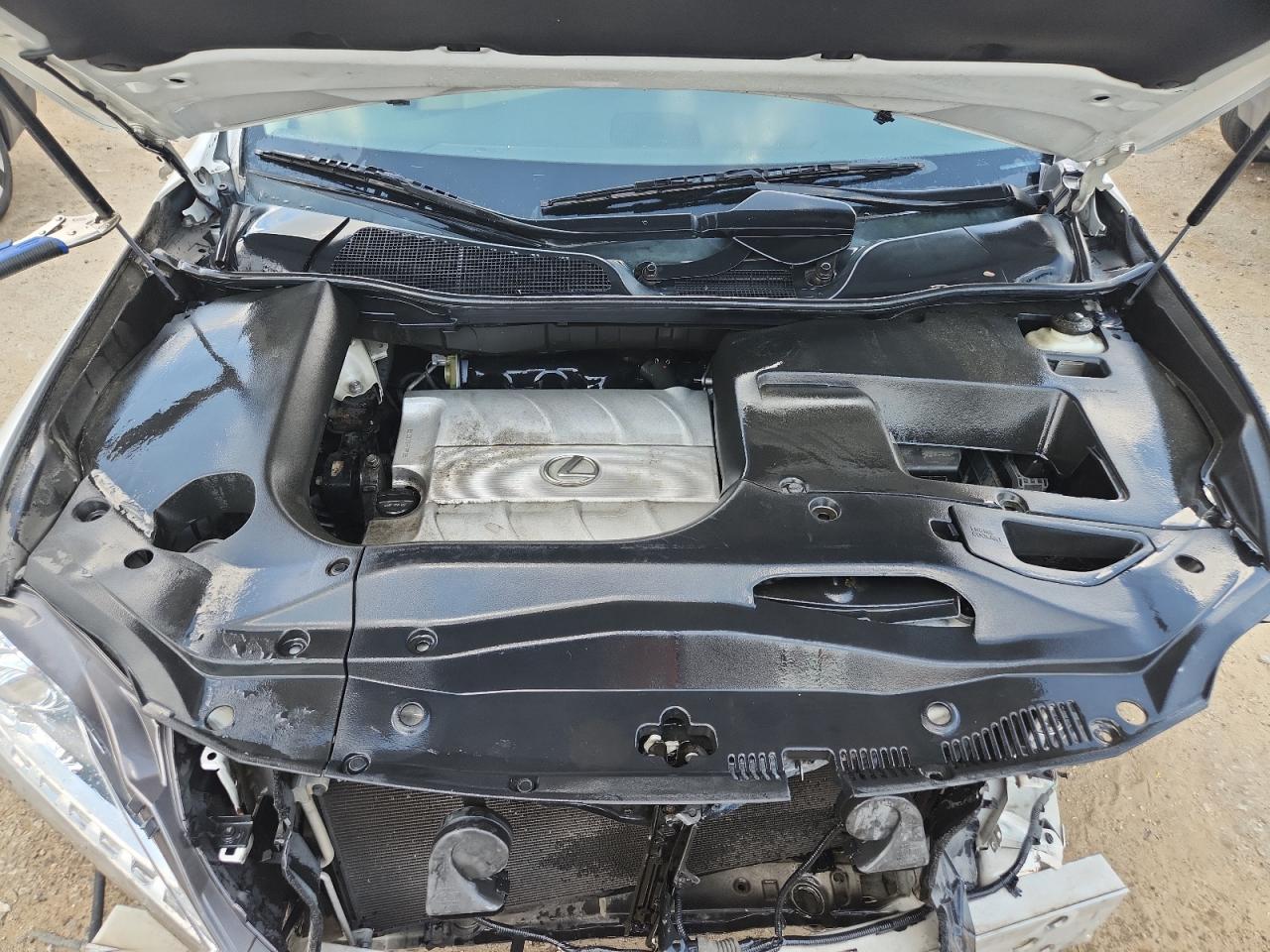 2015 Lexus Rx 350 Base White vin: 2T2ZK1BAXFC167506 Damage: Left Head Lamp, Missing, Replacement Required