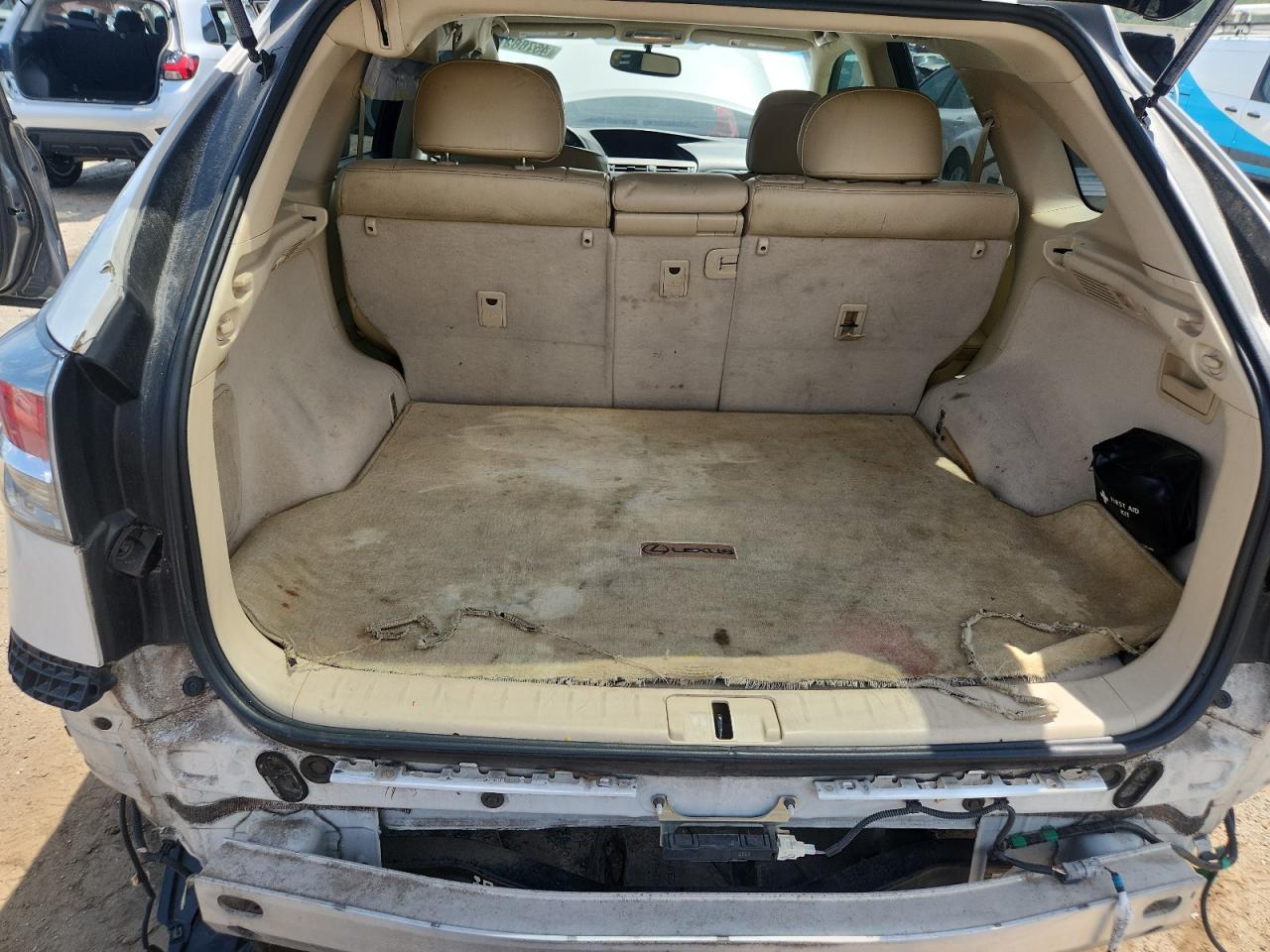 2015 Lexus Rx 350 Base White vin: 2T2ZK1BAXFC167506 Damage: Trunk/Cargo Mat, Cut, > 12 Inches