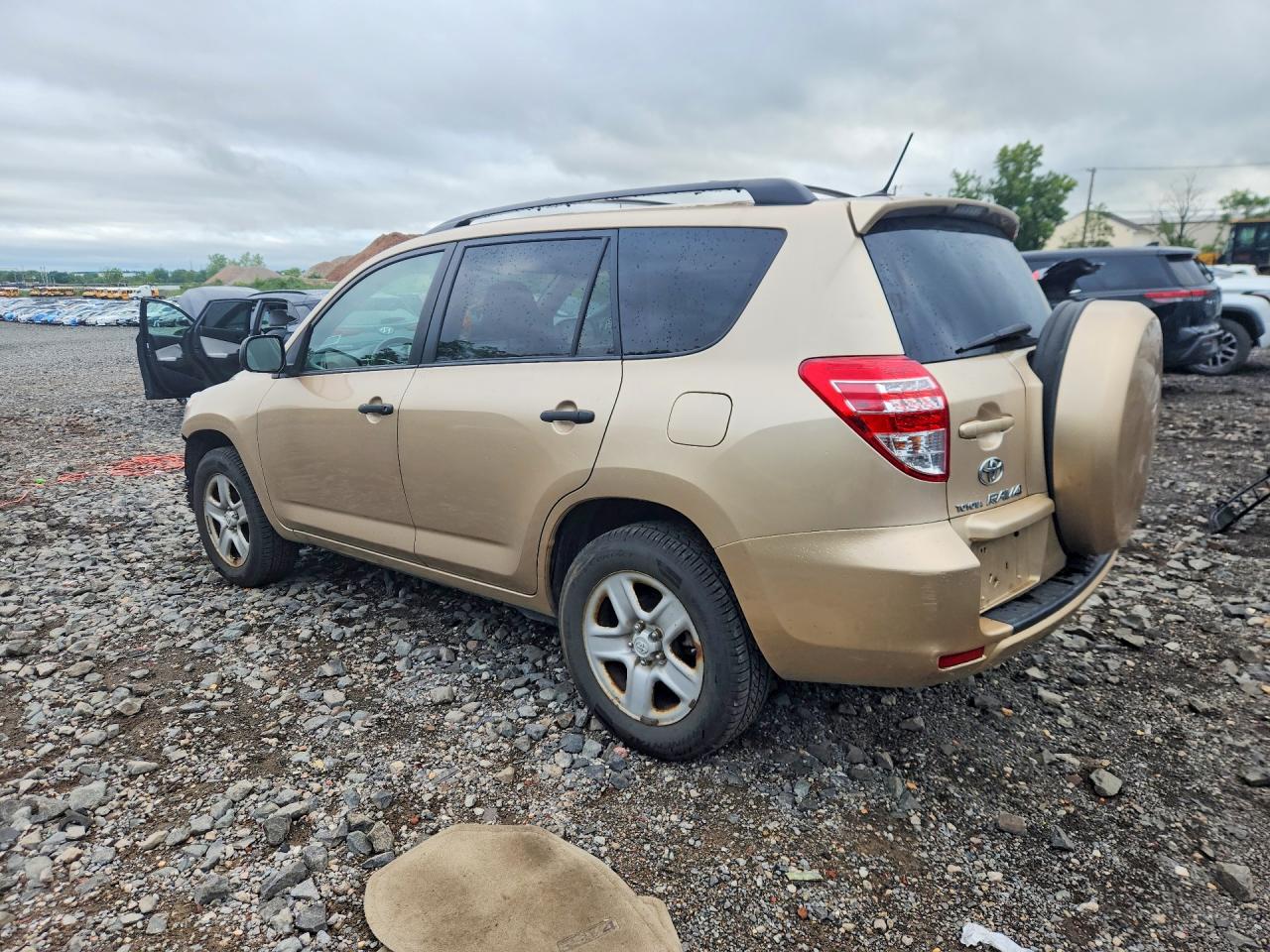 2009 Toyota Rav4 Base Tan vin: 2T3BF33V89W017895