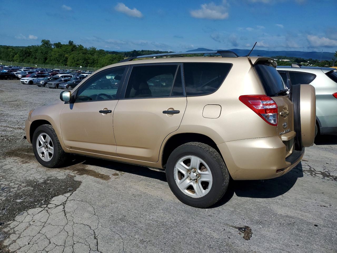 2009 Toyota Rav4 Base Золотой vin: 2T3BF33VX9W004159