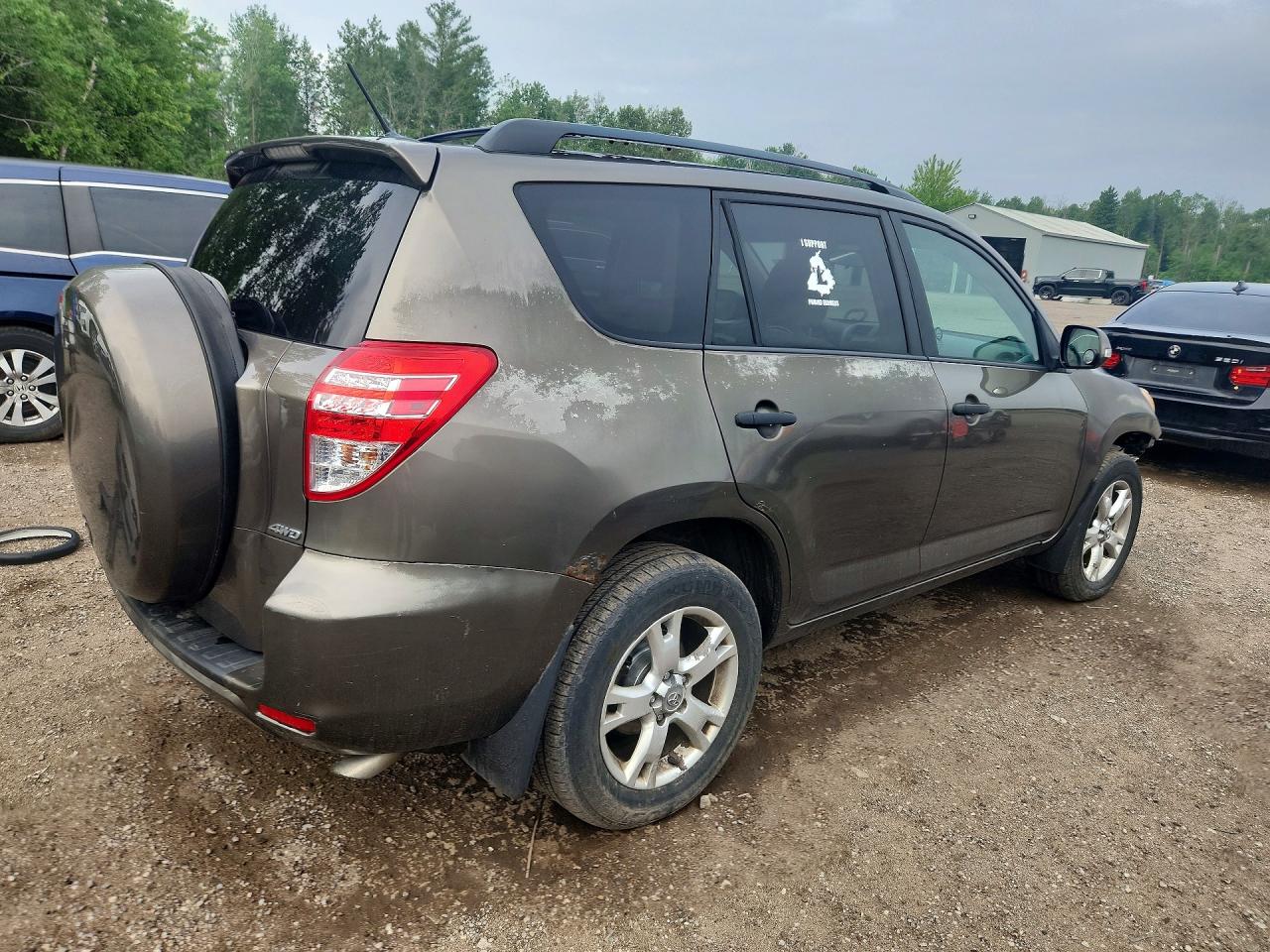 2009 Toyota Rav4 Base Tan vin: 2T3BF33VX9W023200
