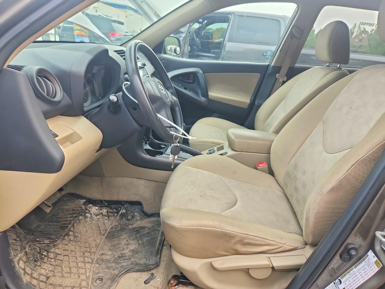 2009 Toyota Rav4 Base Tan vin: 2T3BF33VX9W023200