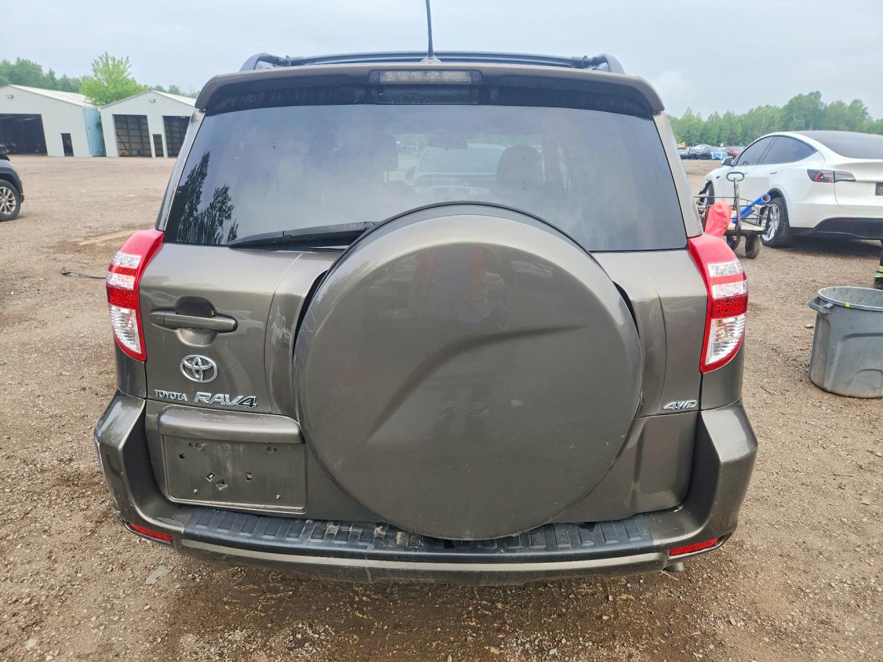 2009 Toyota Rav4 Base Tan vin: 2T3BF33VX9W023200
