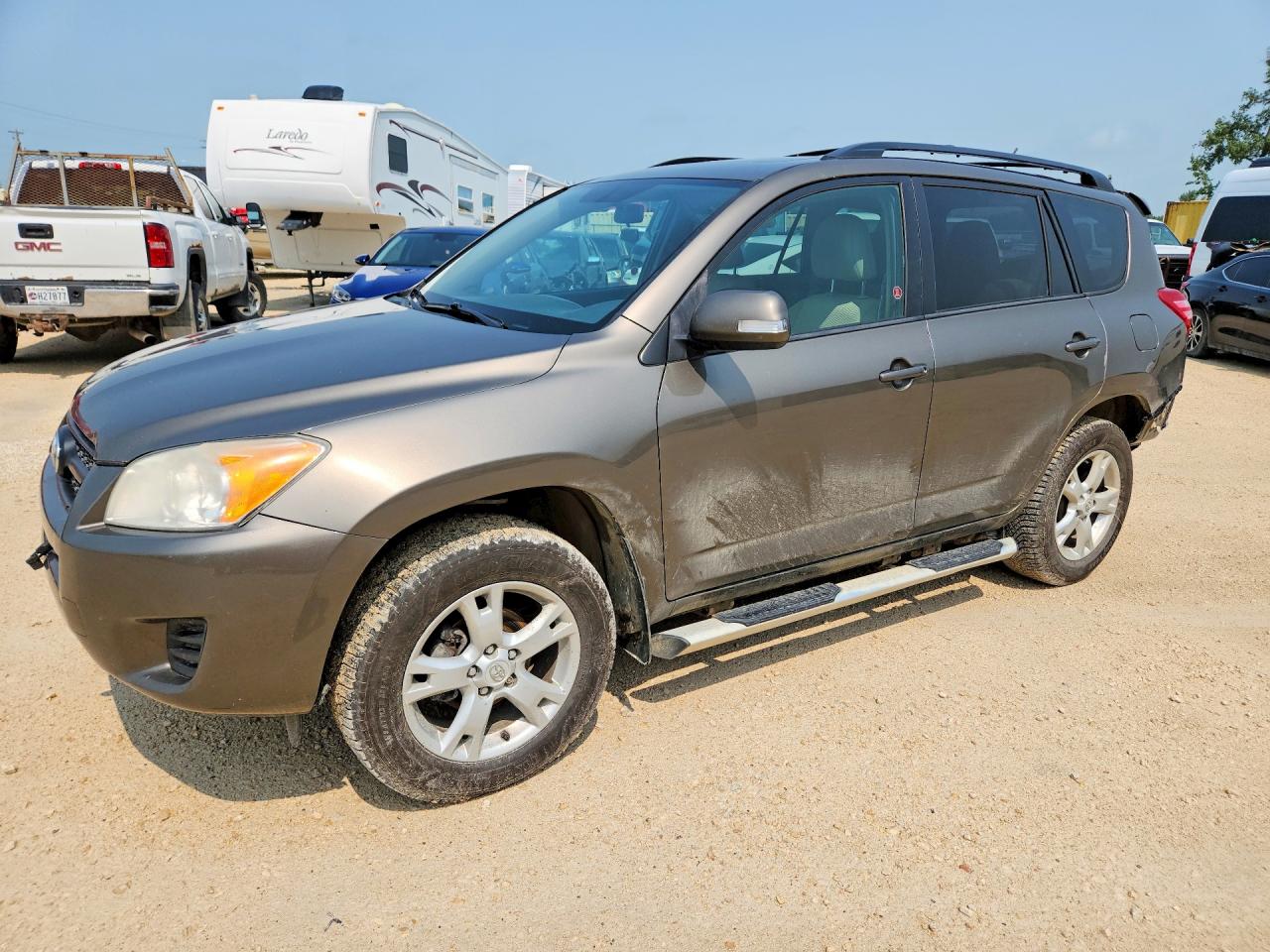 2012 Toyota Rav4 Base Tan vin: 2T3BF4DV6CW242084