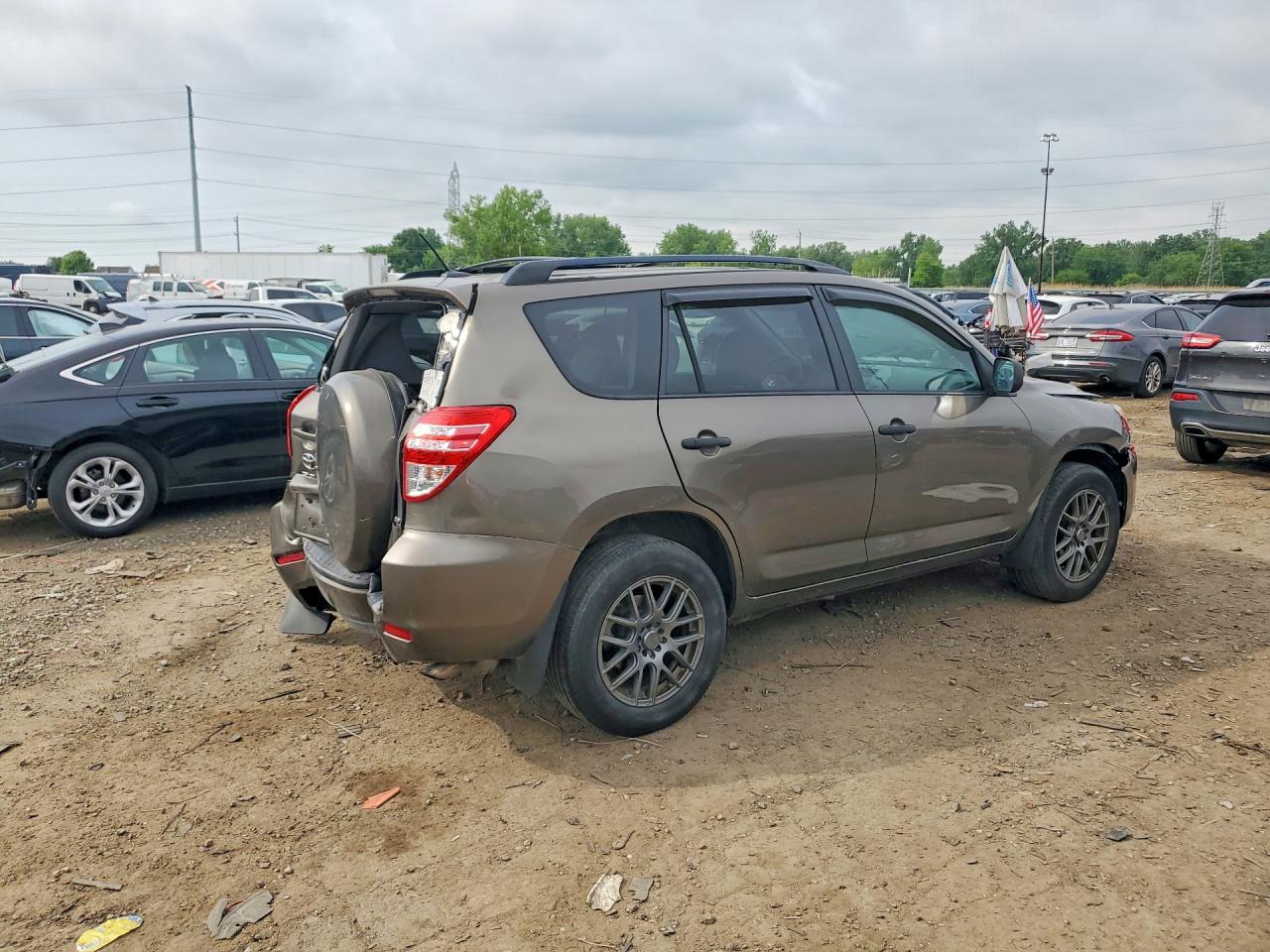 2011 Toyota Rav4 Base Tan vin: 2T3BF4DV8BW149551