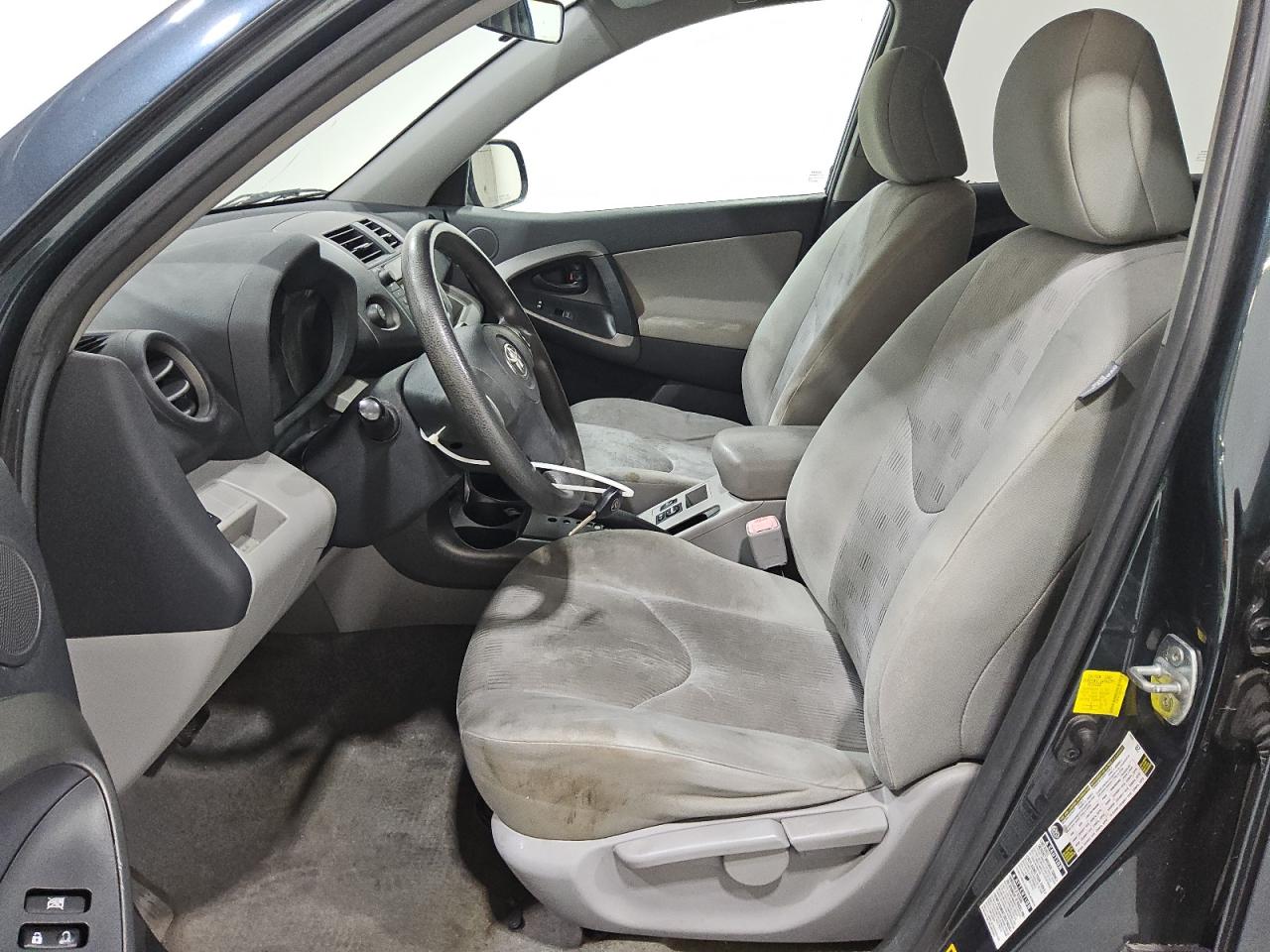 2011 Toyota Rav4 Base Blue vin: 2T3BF4DVXBW134825 Damage: Left Front Seat Cushion, Stained, Permanent