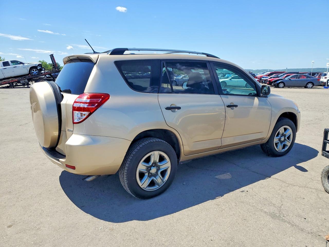 2010 Toyota Rav4 Base Tan vin: 2T3JF4DV4AW069500
