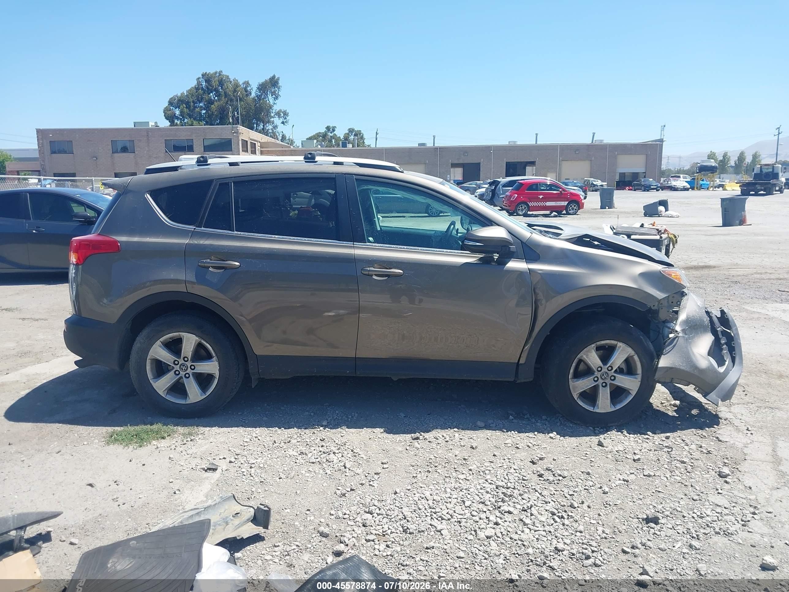 2015 Toyota Rav4 Xle Champagne vin: 2T3WFREV9FW203667