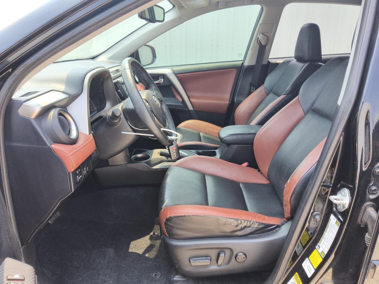 2014 Toyota Rav4 Limited Black vin: 2T3YFREV8EW093489 Damage: Left Front Seat, Torn, 1 To 2 Inches