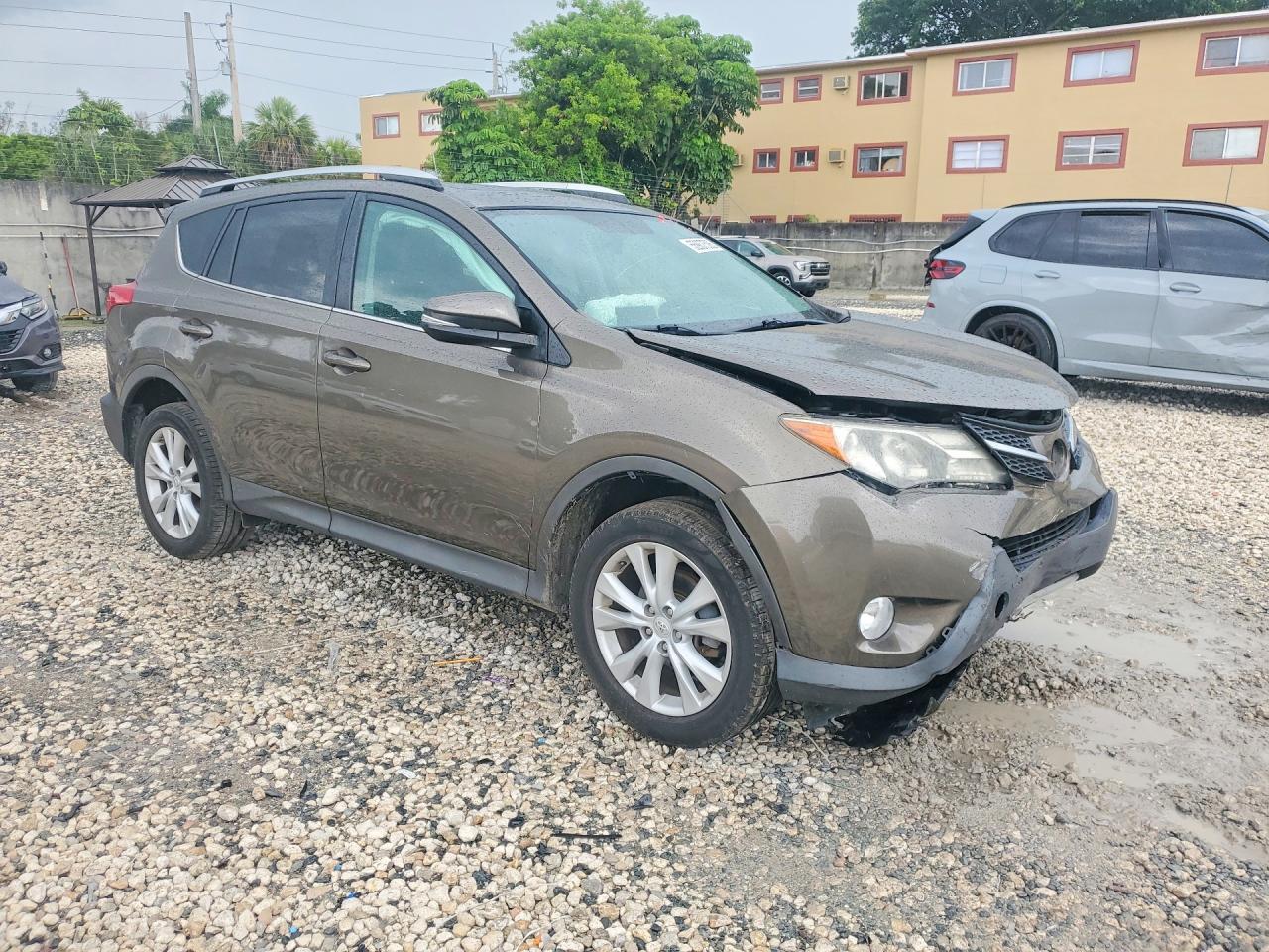 2015 Toyota Rav4 Limited Желто-коричневый vin: 2T3YFREV9FW203273