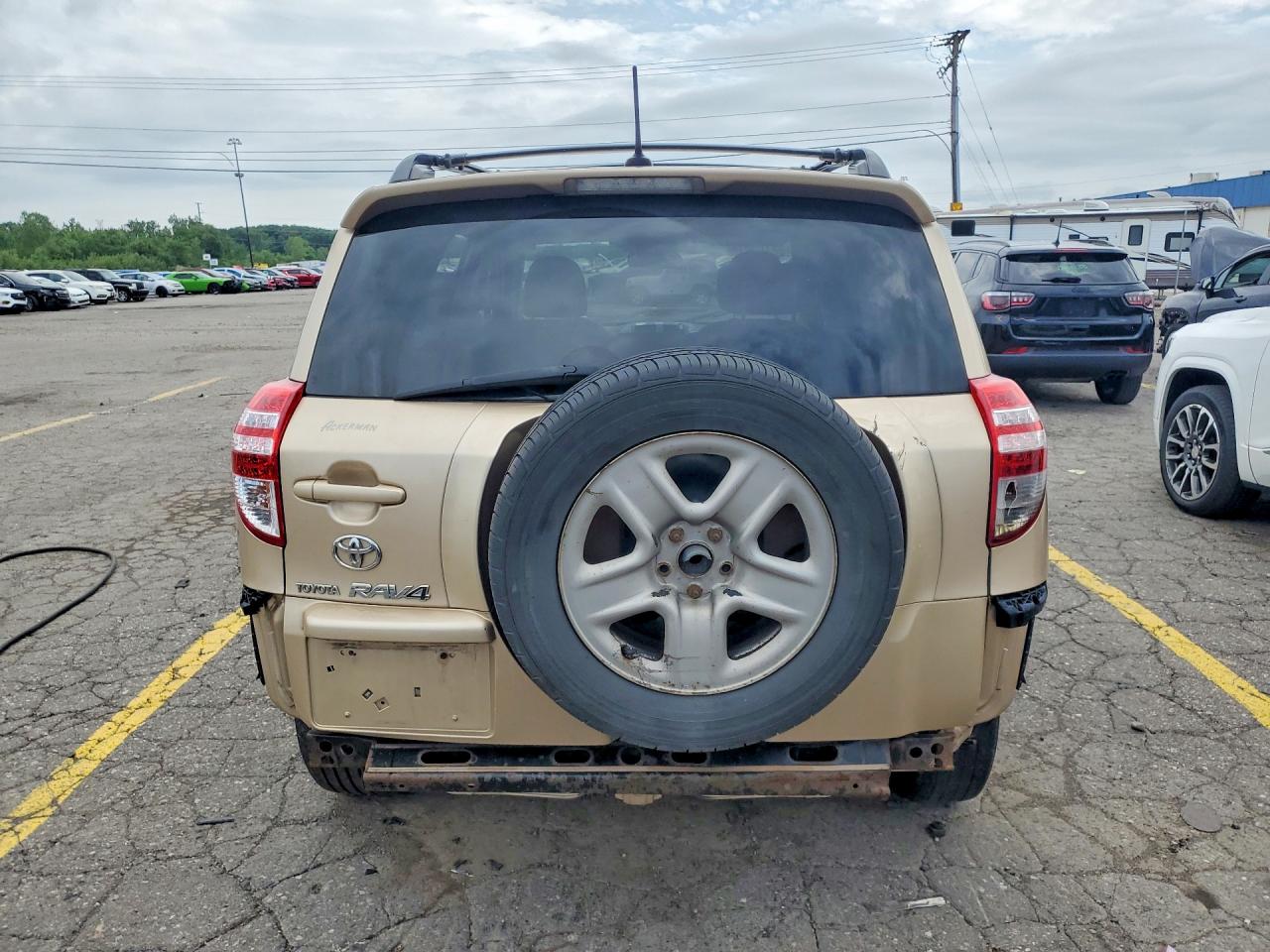2009 Toyota Rav4 Base Золотой vin: 2T3ZF33V39W010691